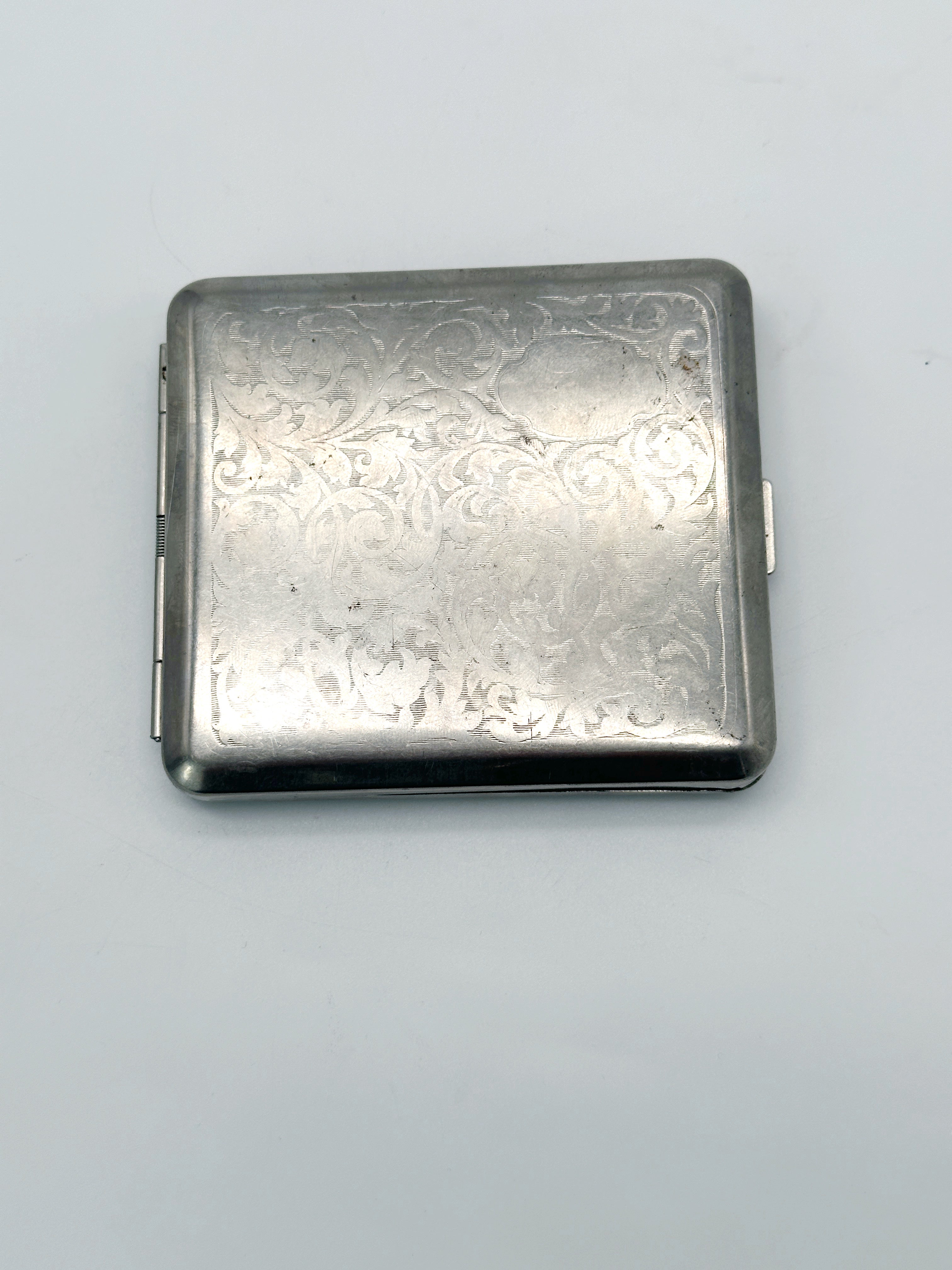 Silver-plated cigarette case with vine motif