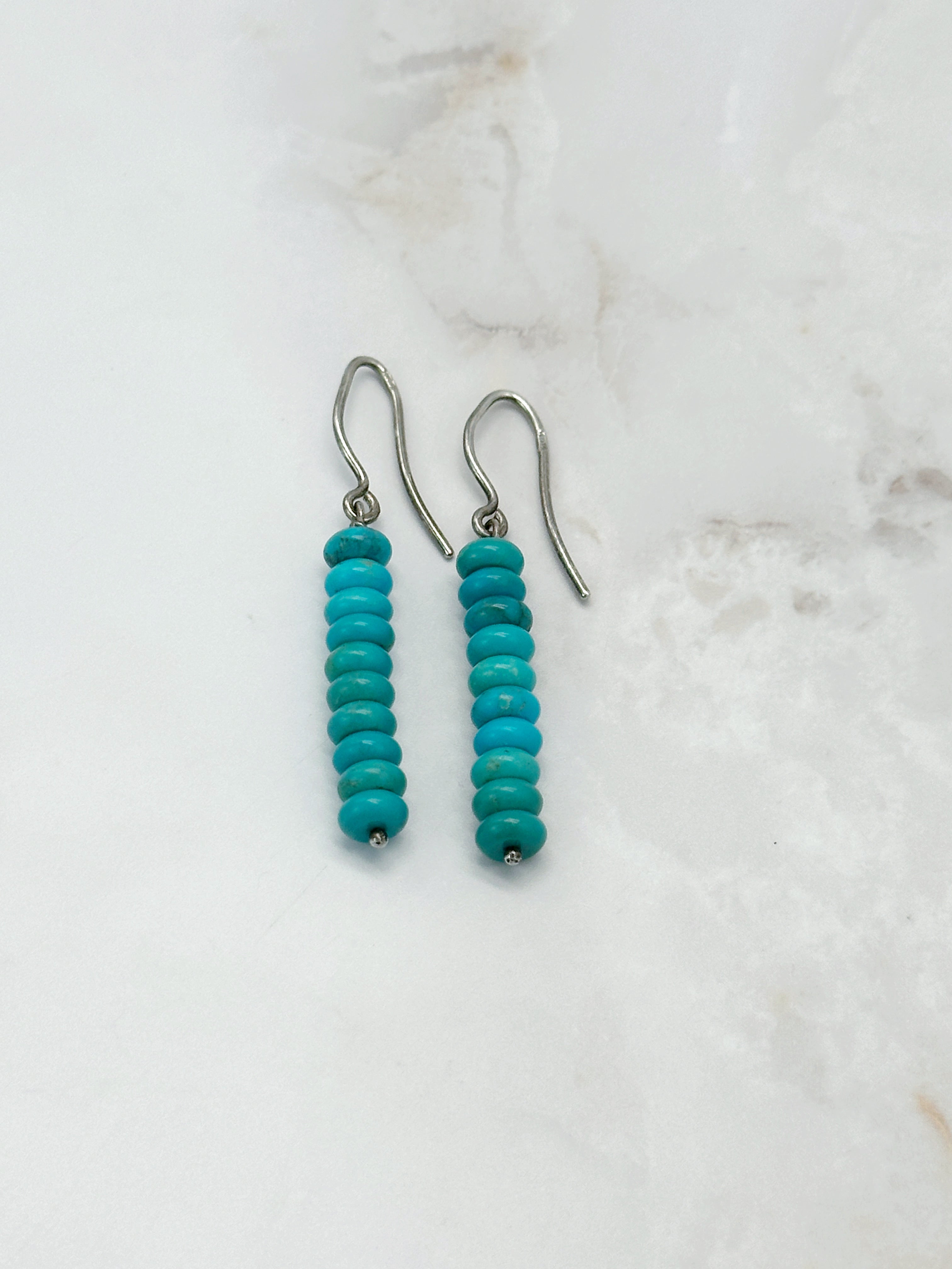 Long silver earrings with turquoise