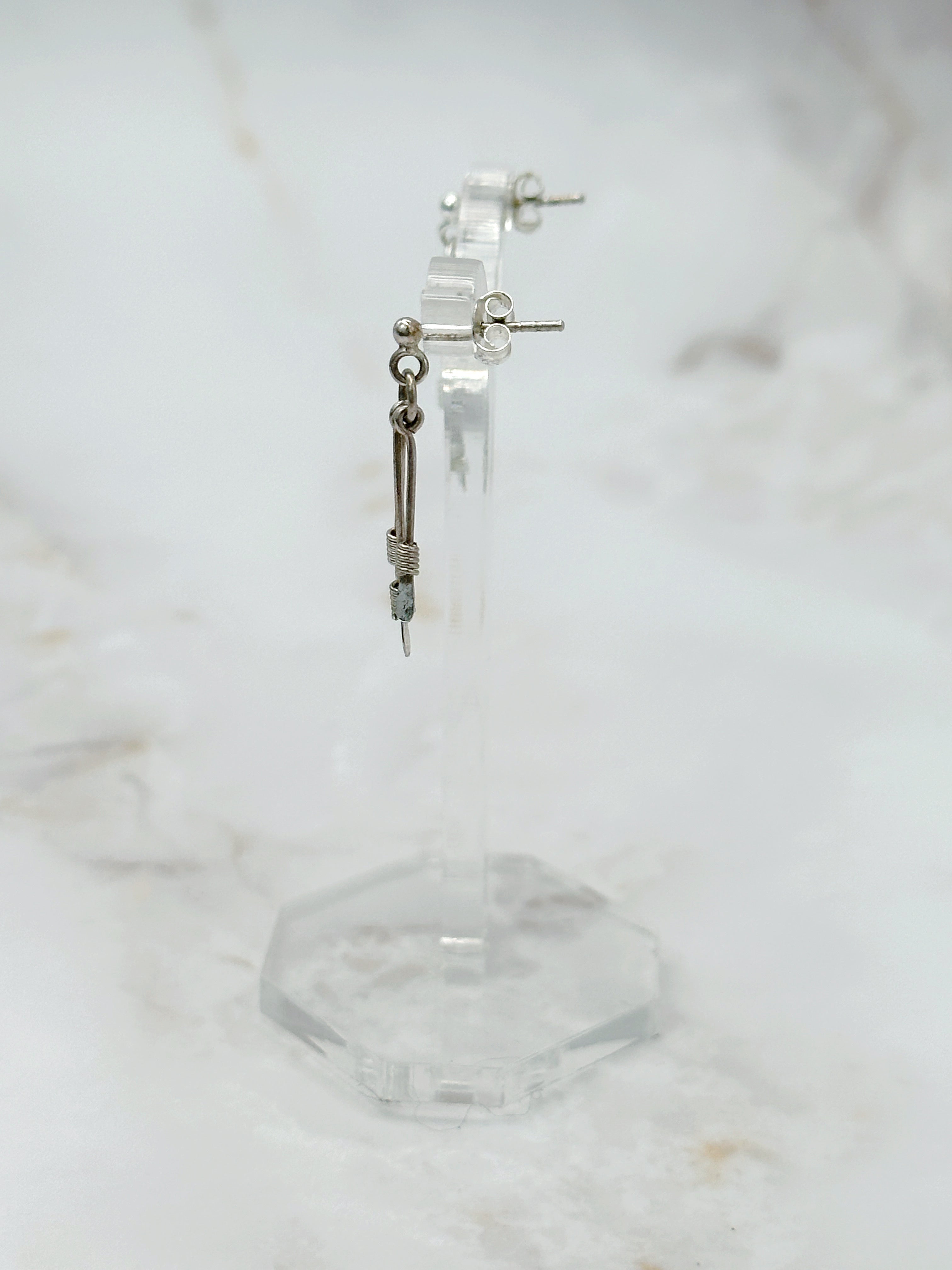 Minimalist silver stud earrings with hanging bars