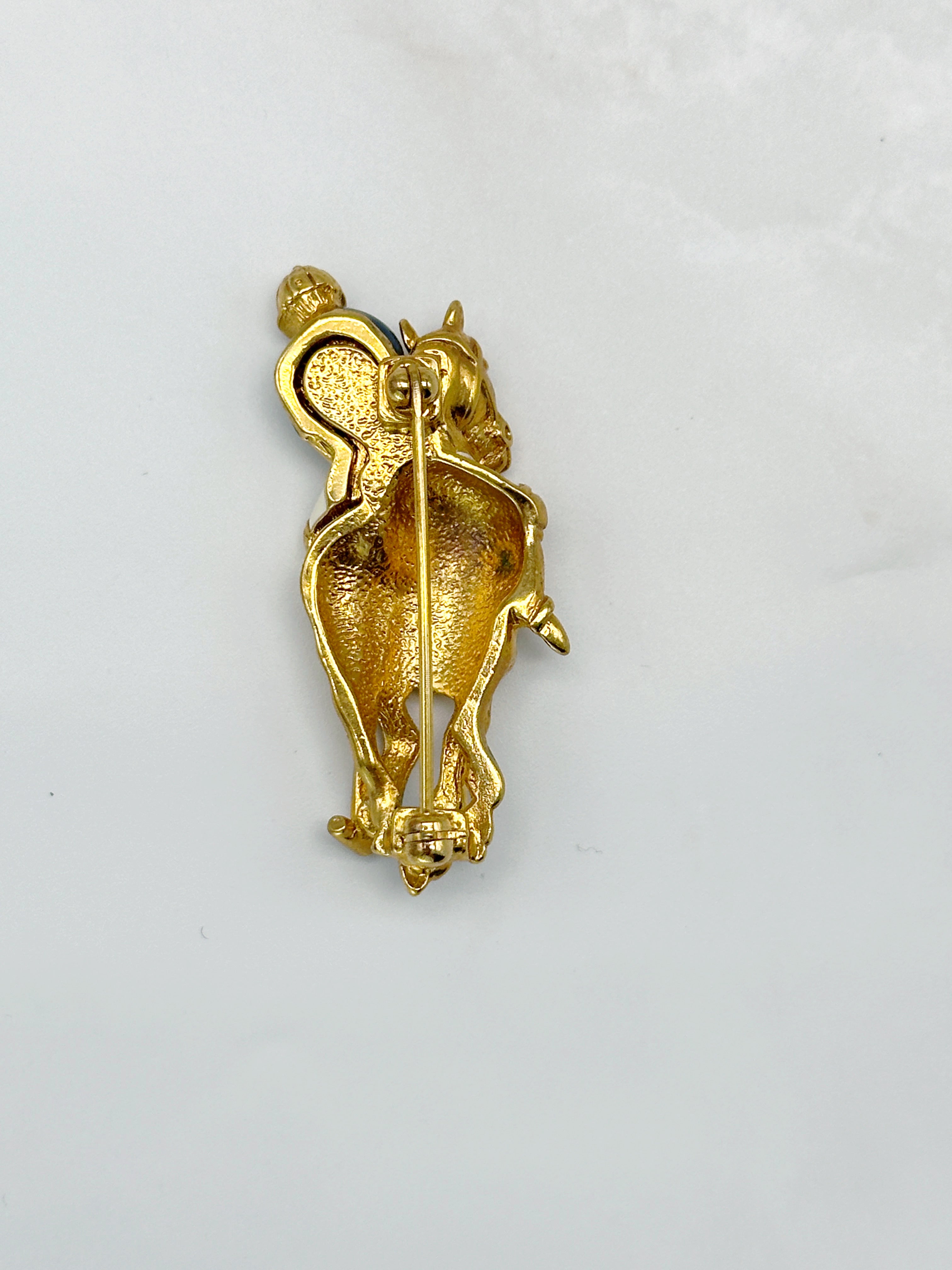 Vintage brooch polo player