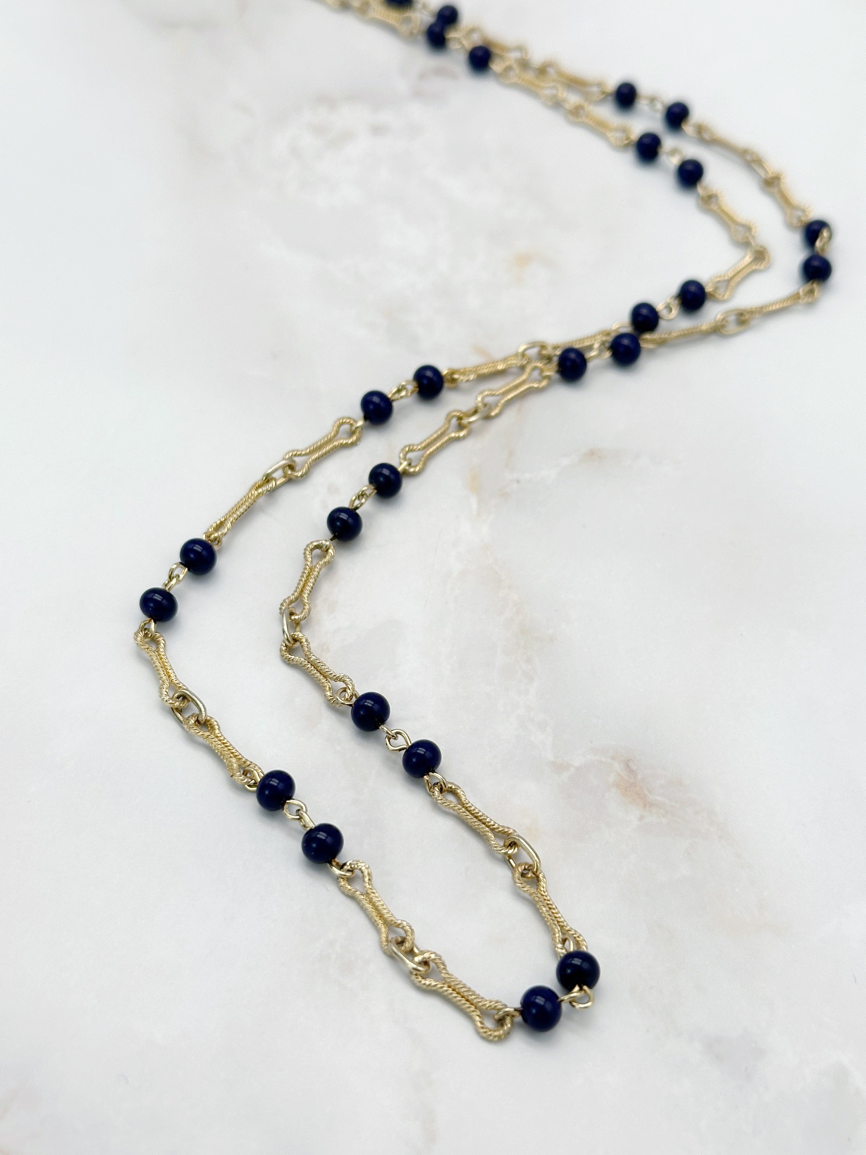 Long vintage necklace with blue elements
