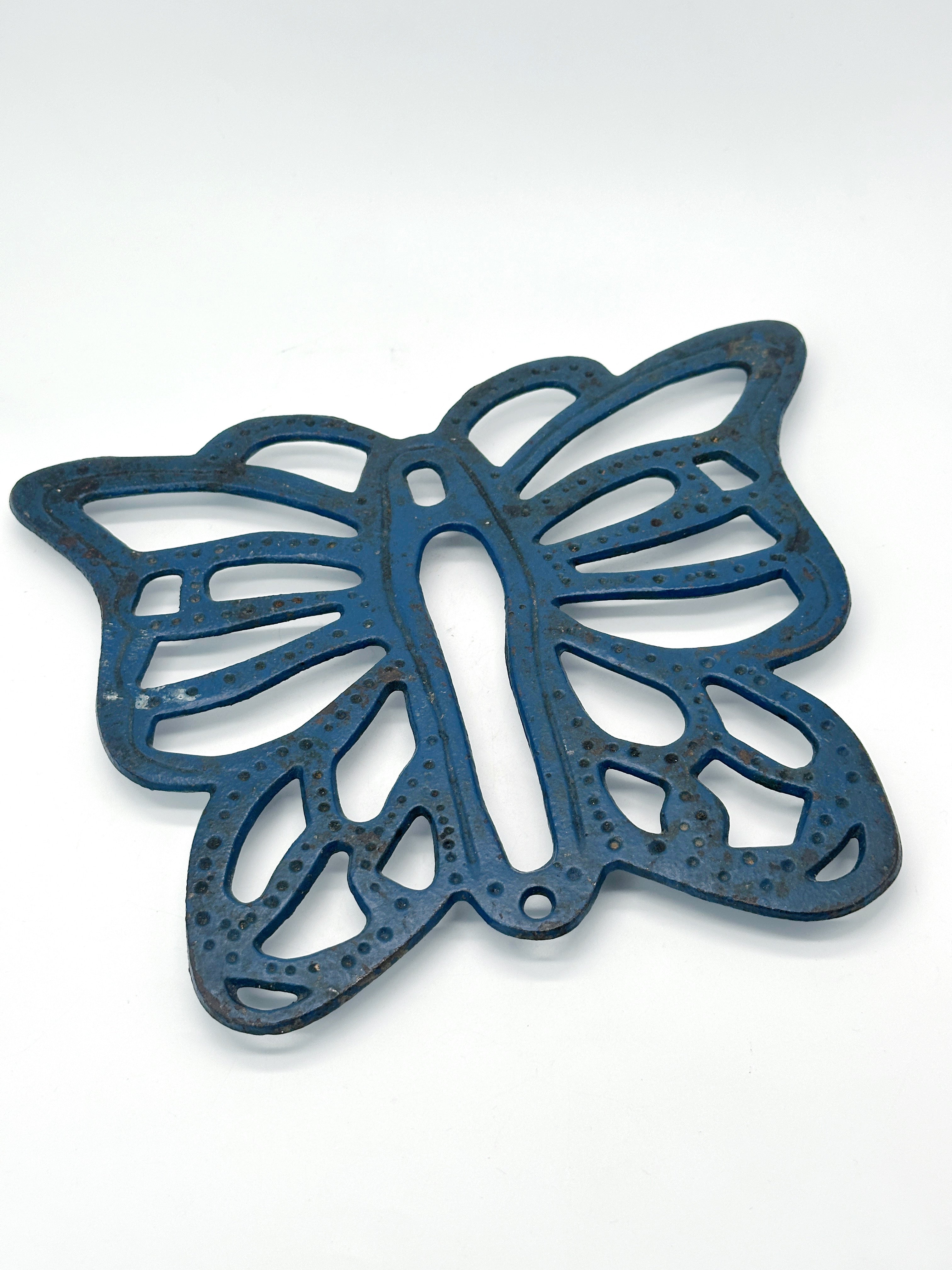Blauer Untersetzer aus Gusseisen in Schmetterlingsform