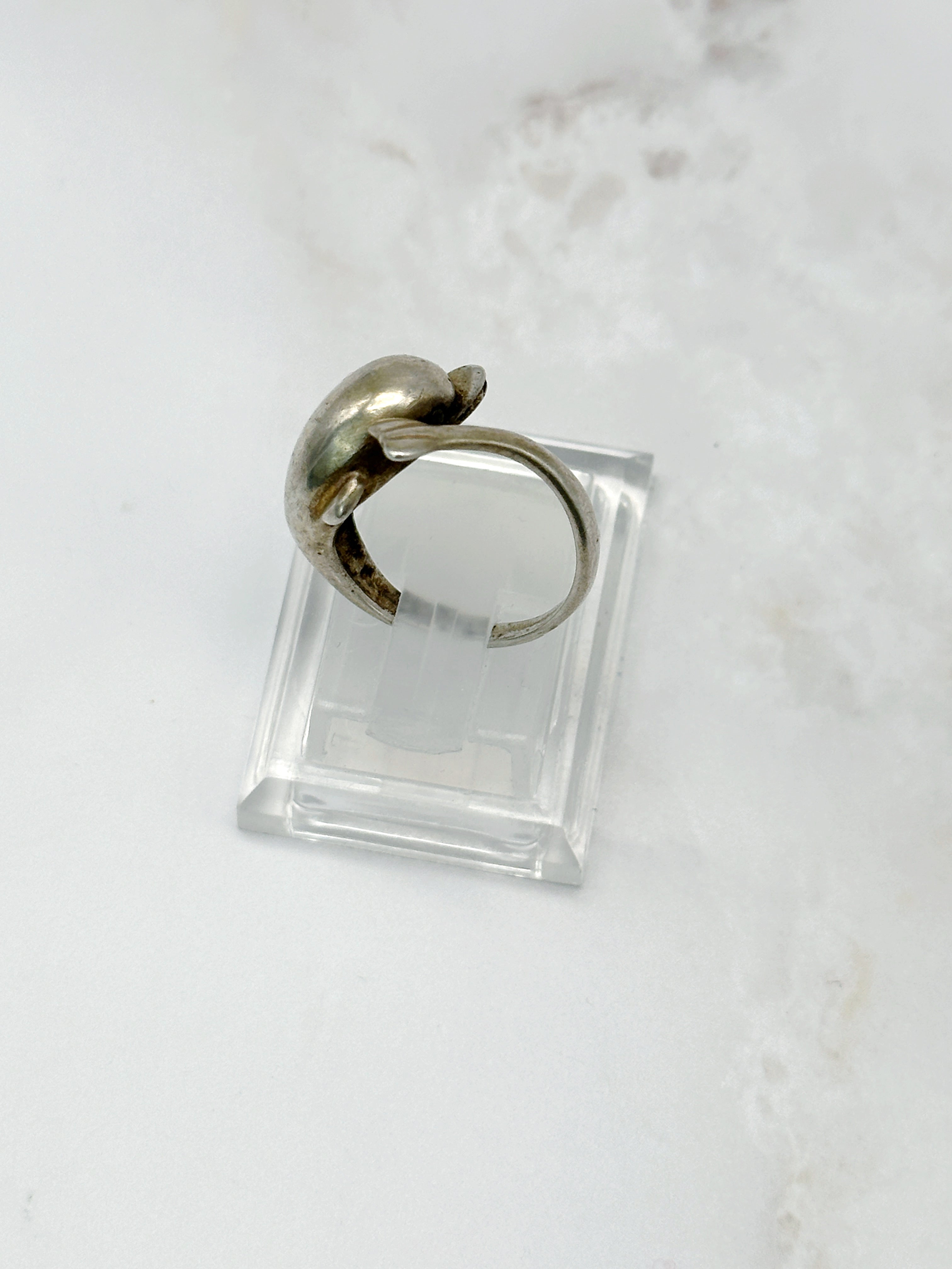 Silver ring with dolphin motif