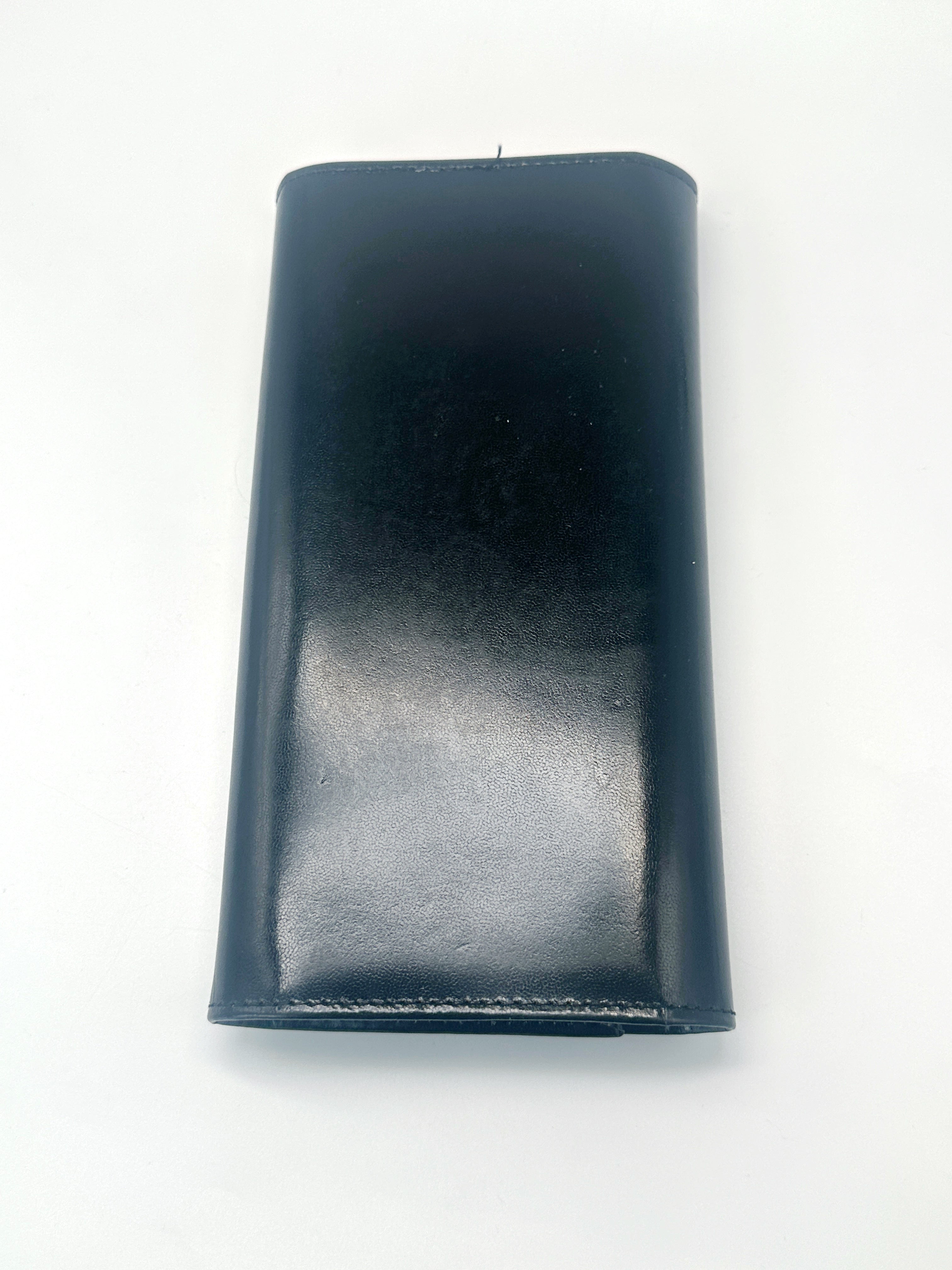 Vintage Schmucketui zum Rollen aus Leder mit dunkelrotem Samt