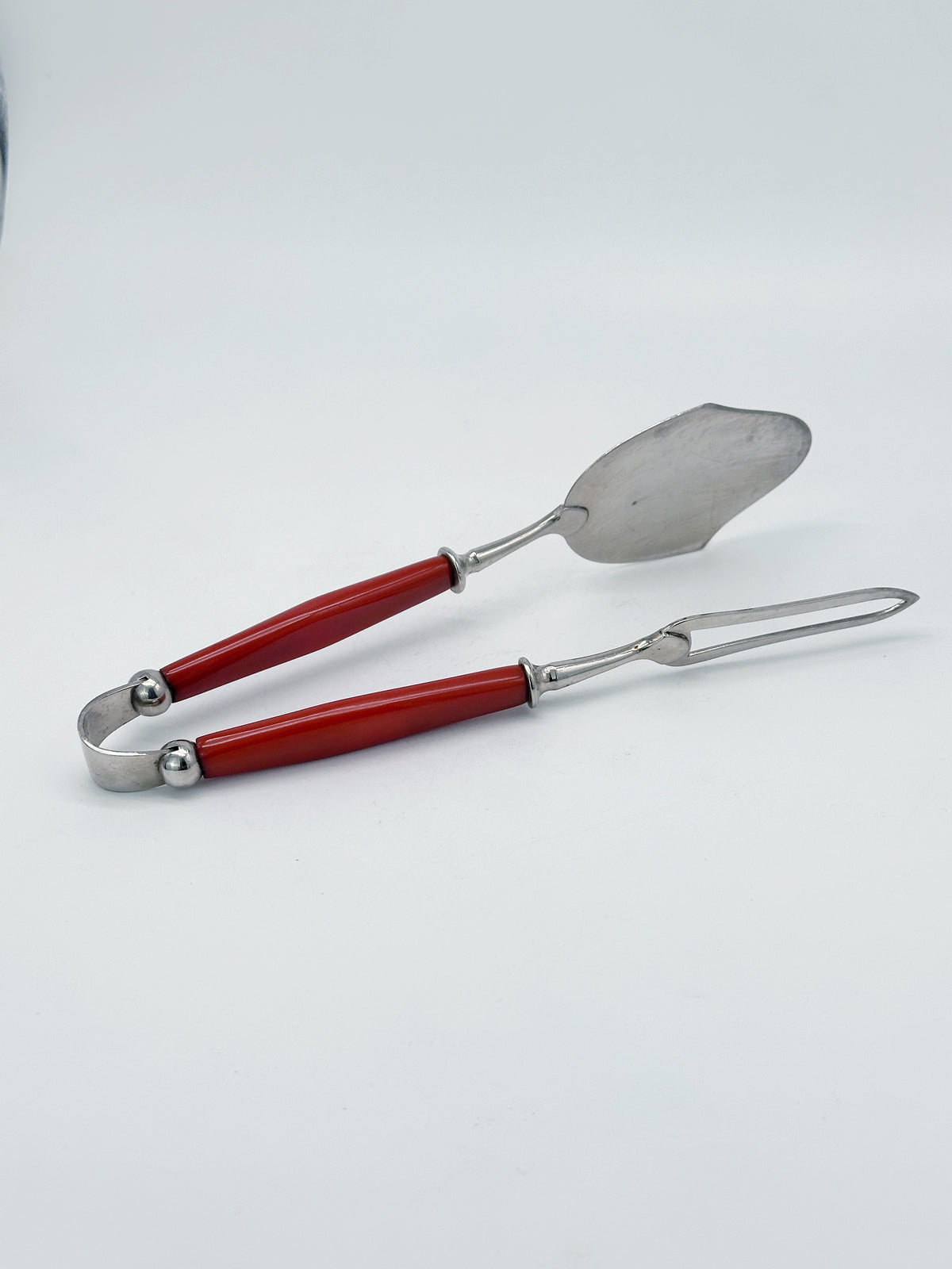 Vintage Servierzange mit roten Lucite-Griffen