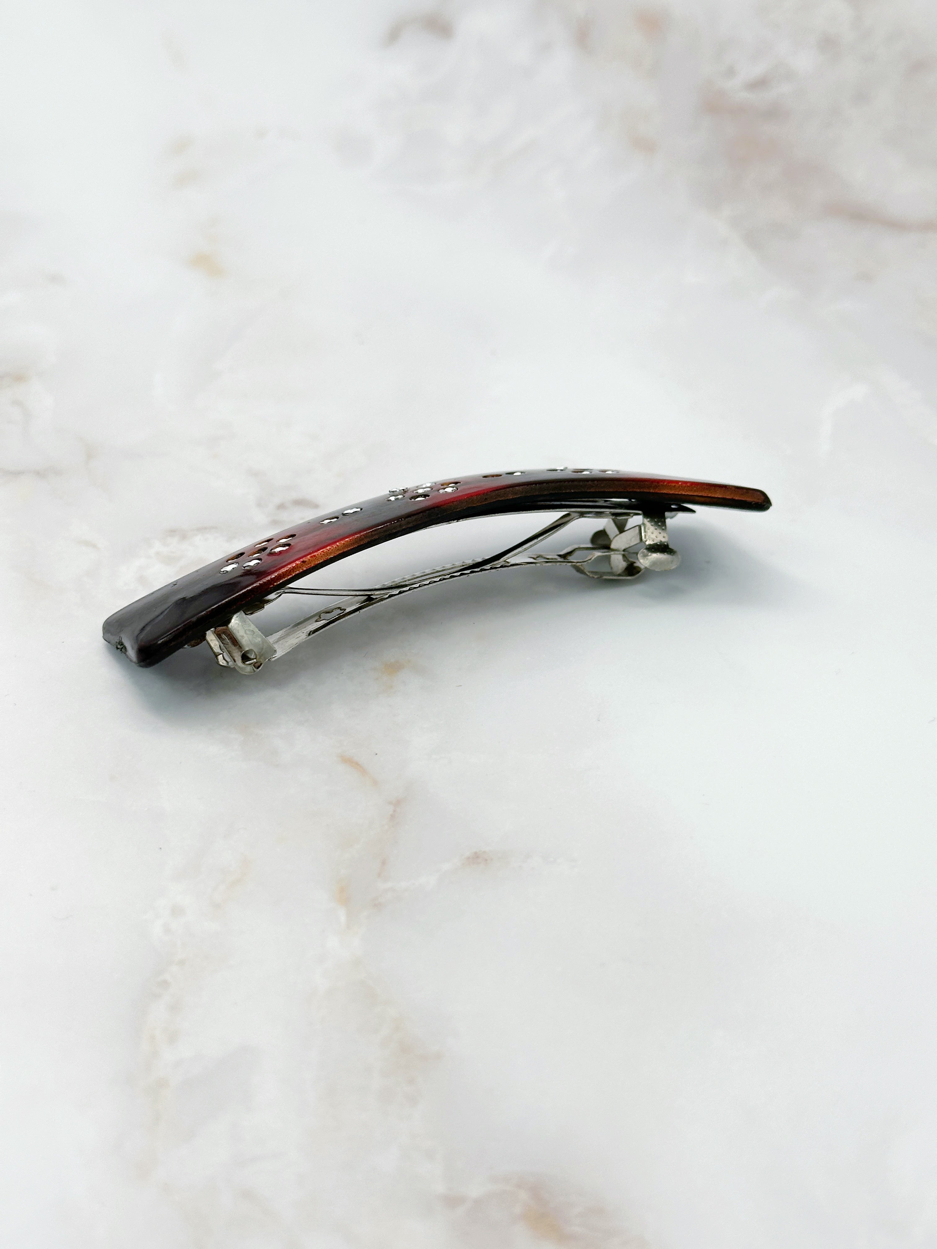 Sparkling wave-shaped hair clip with rhinestones