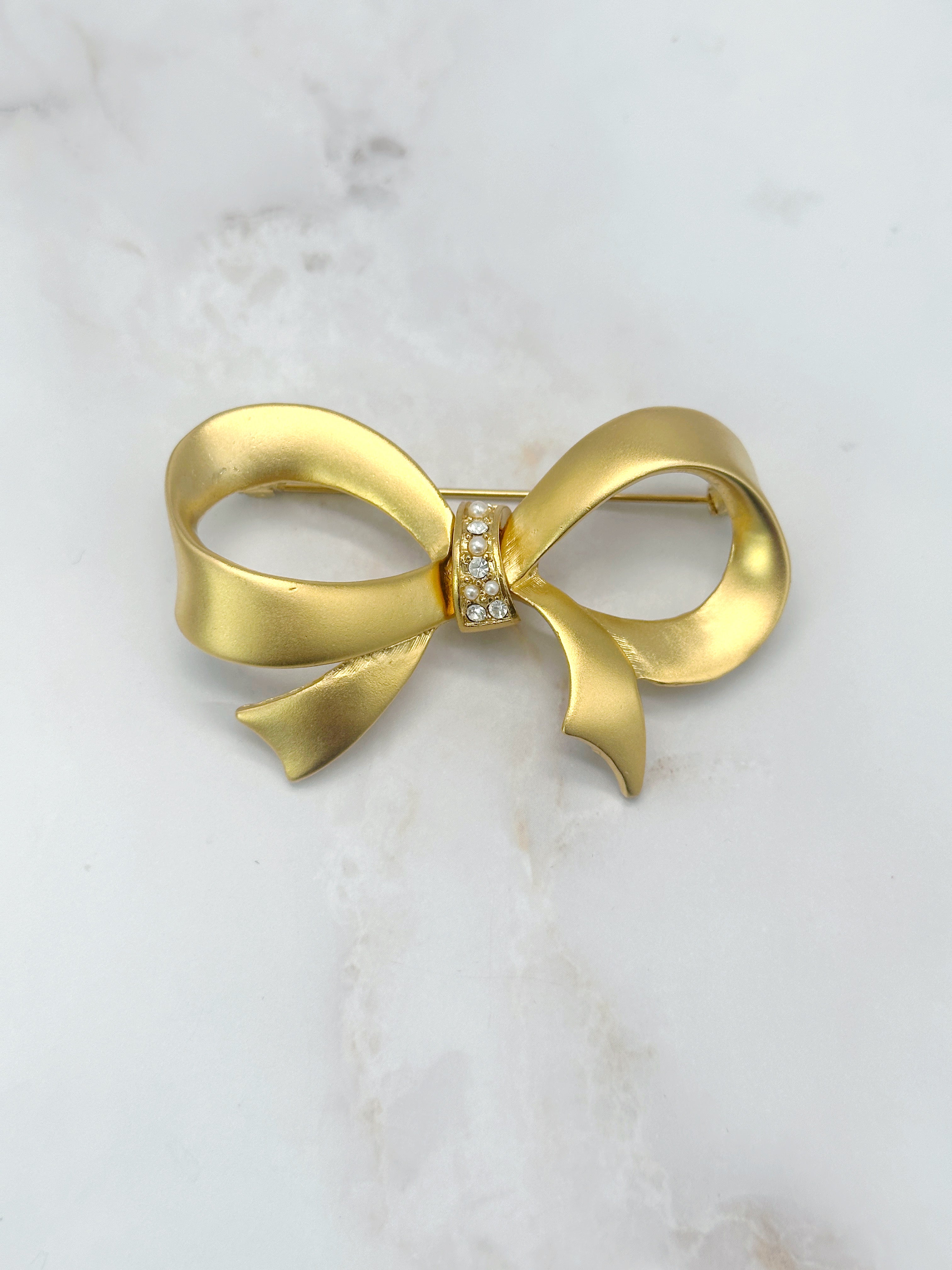 Große Vintage Brosche in Schleifenform vergoldet mit Strass