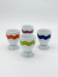 Set aus 4 bunten Porzellan Eierbechern mit Goldrand