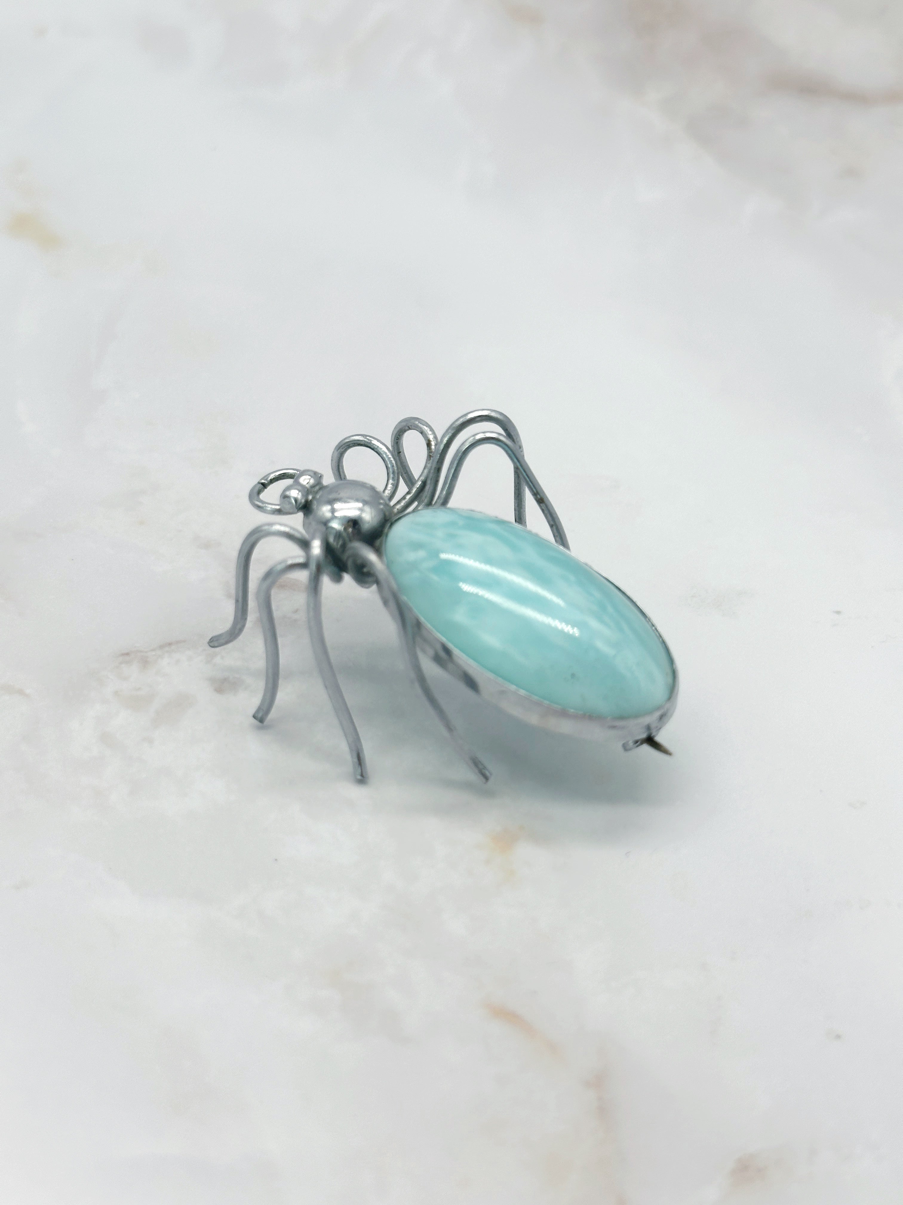 Brosche Spinne mit türkisem Glas