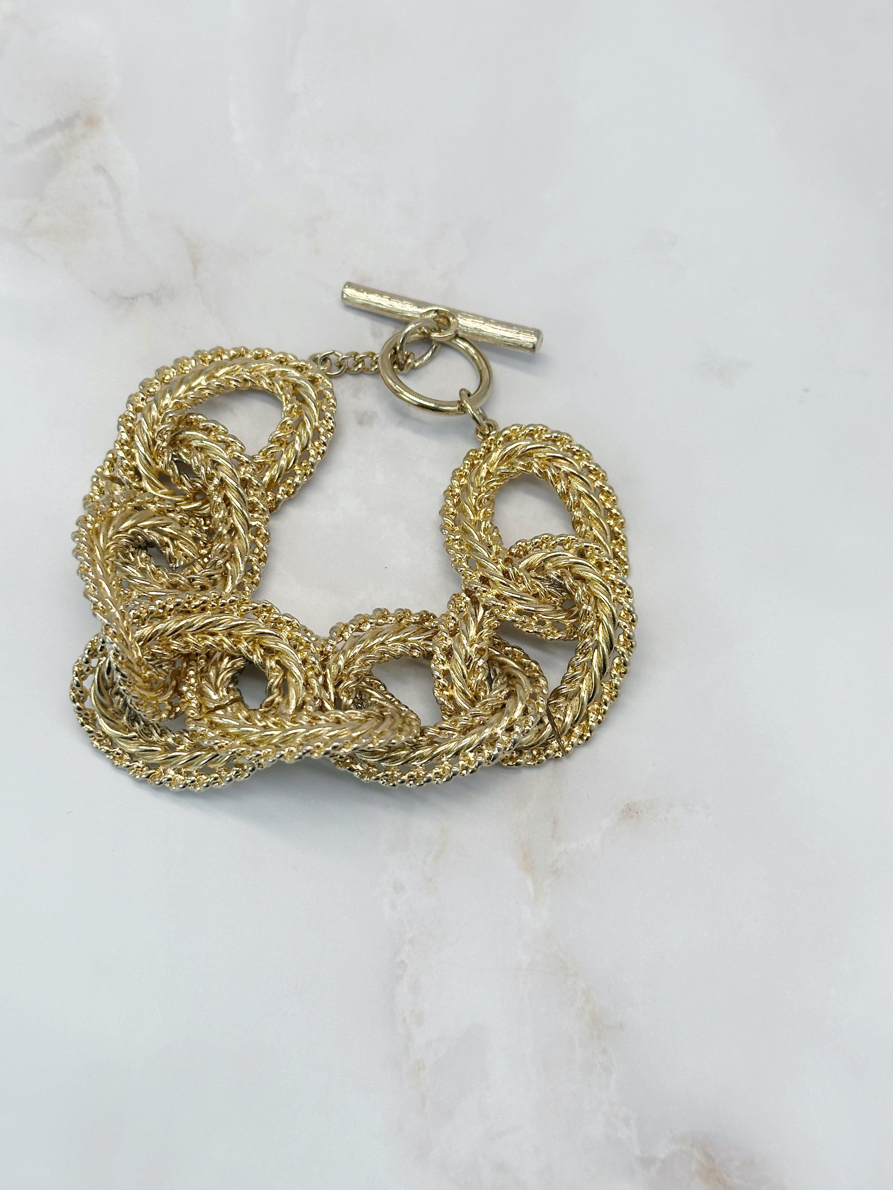 Vergoldetes Statement Armband in Seiloptik