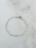 Silberfarbenes Tennisarmband mit Strass