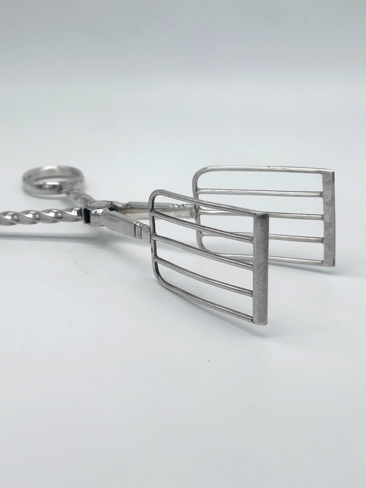 Vintage Gebäckzange aus versilbertem Metall