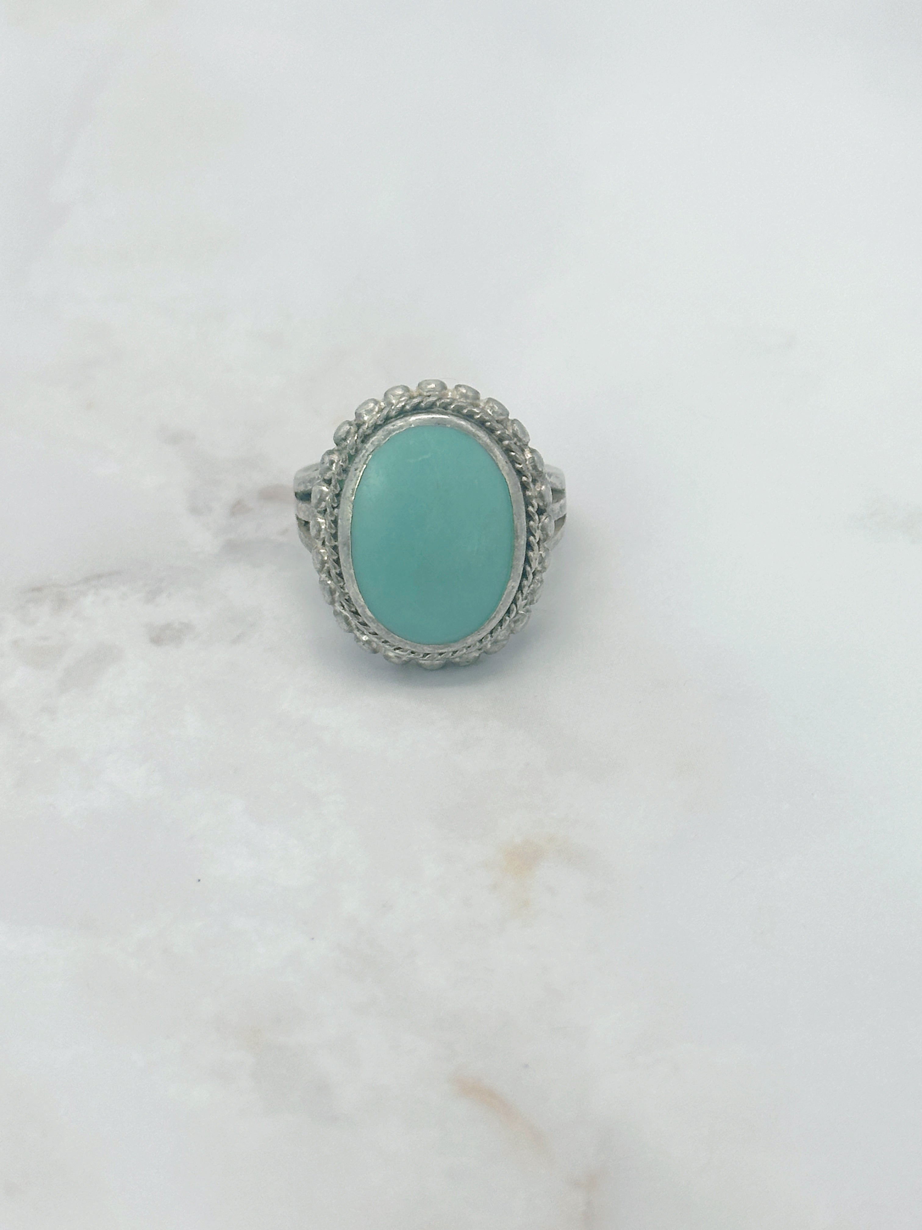 Ring aus 925 Sterling Silber mit leuchtendem Glaselement in Türkis