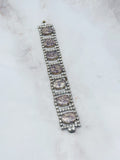 Gablonzer Vintage Armband mit changierenden violett-goldenen Glaskristallen