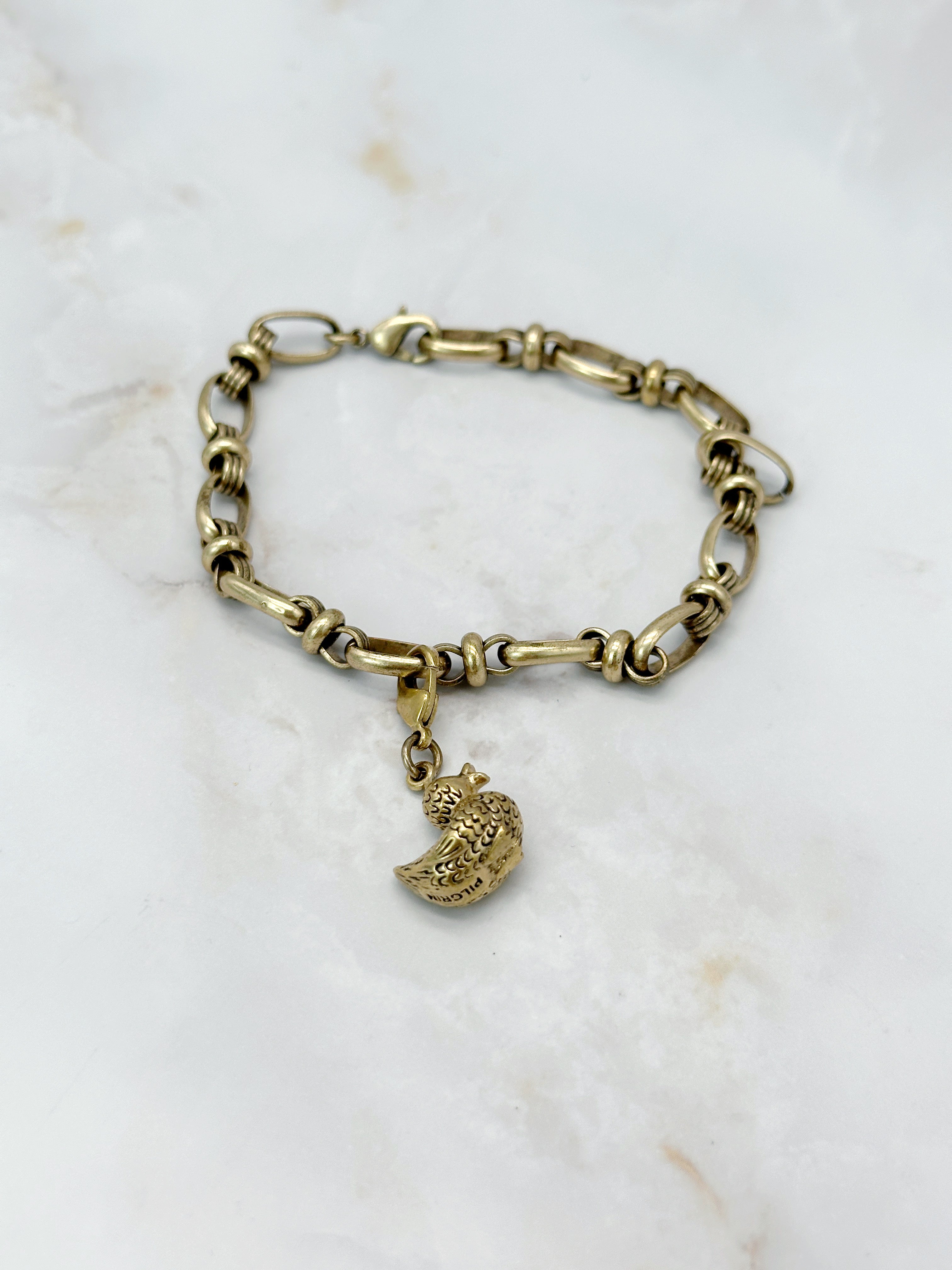 Verspieltes, vergoldetes Armband mit Entenanhänger