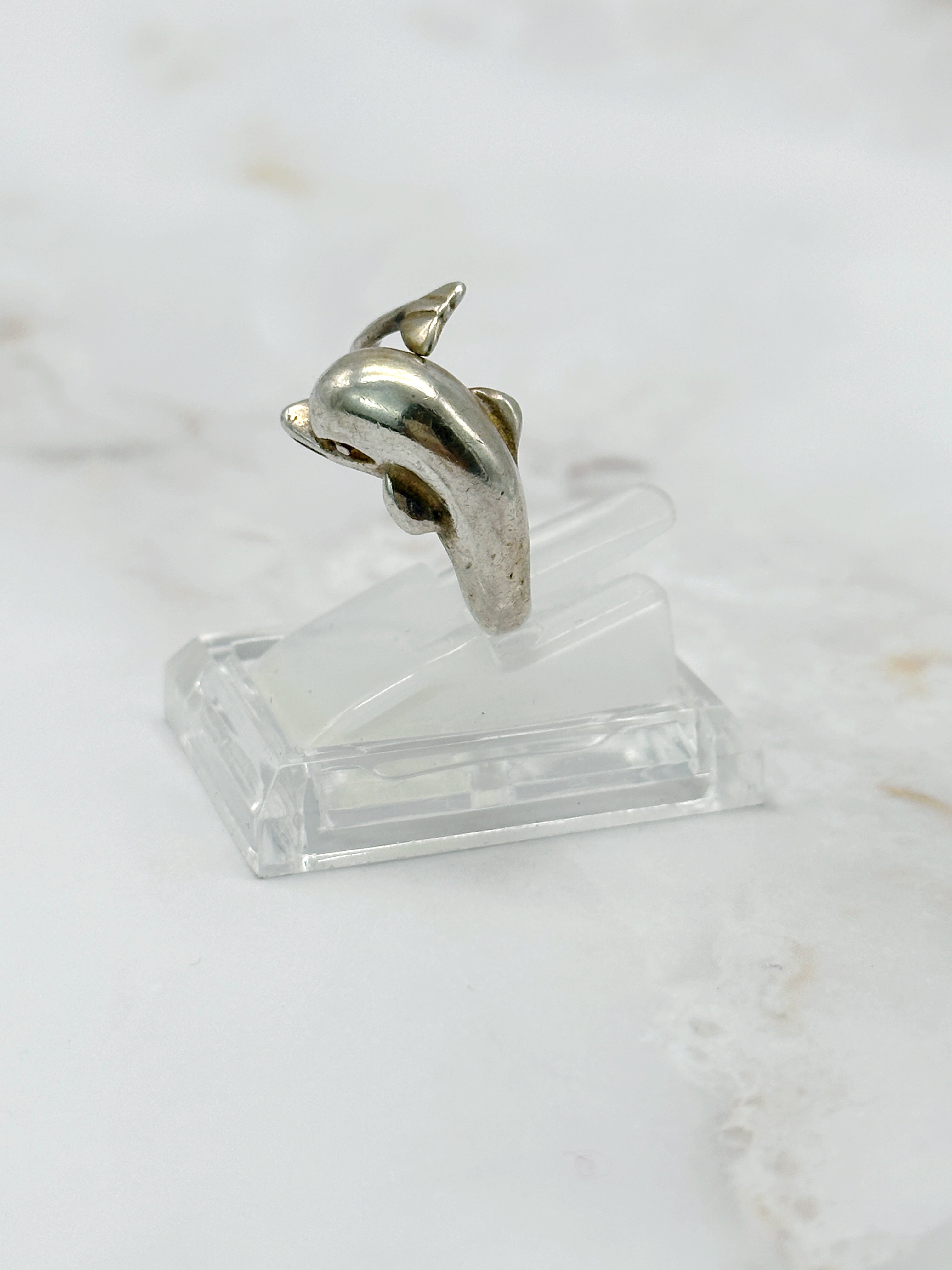 Silver ring with dolphin motif