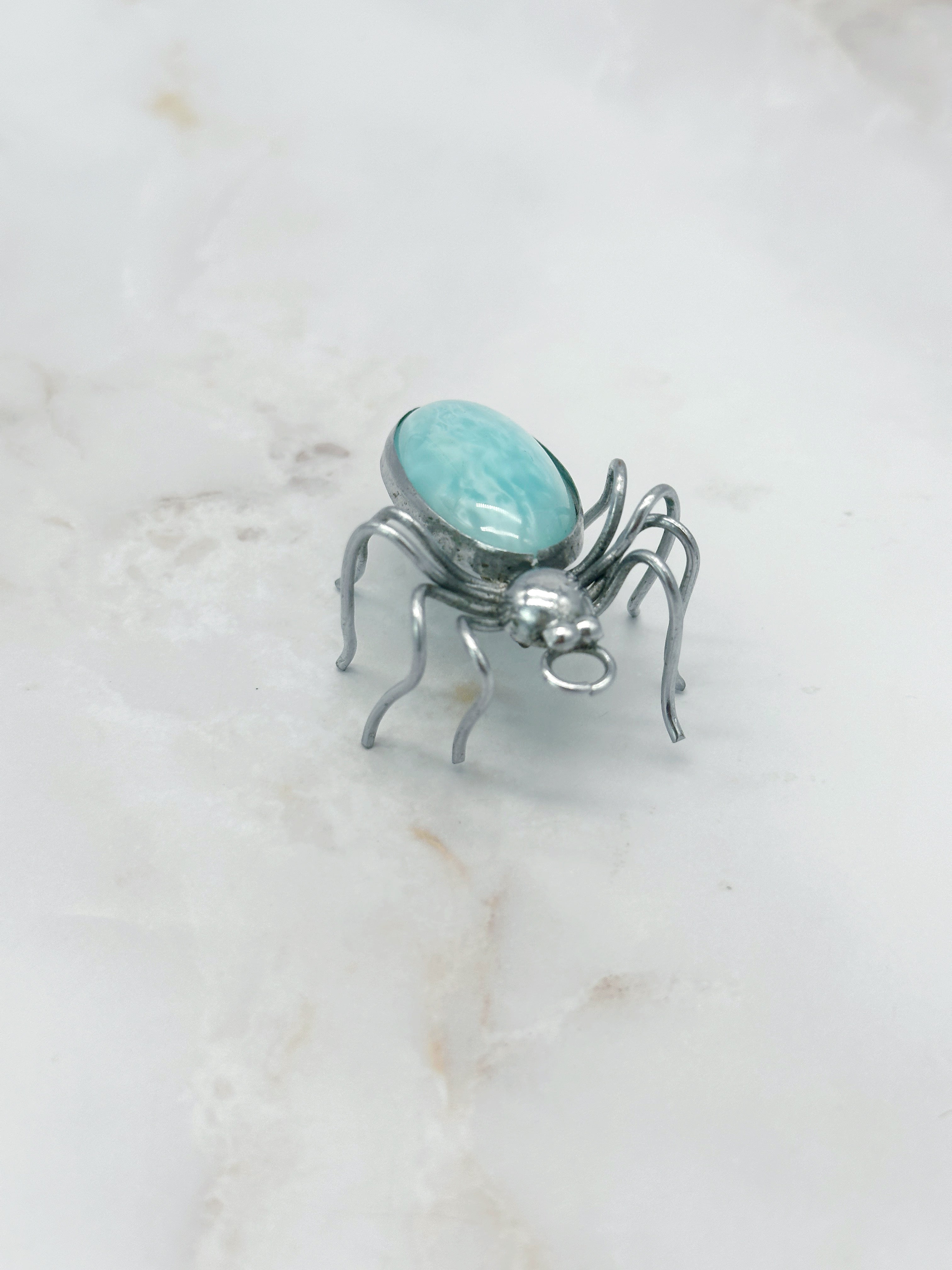 Brosche Spinne mit türkisem Glas