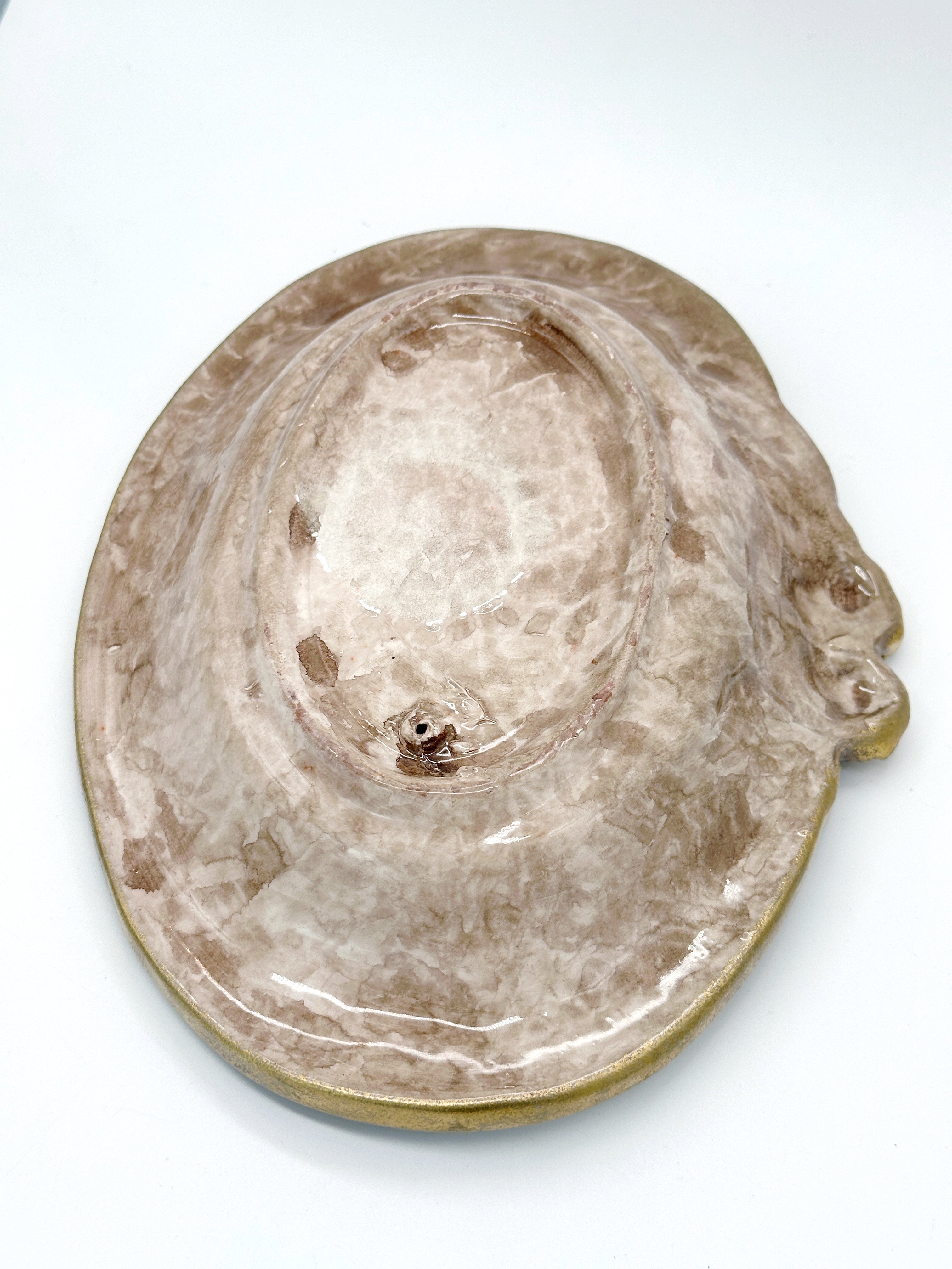 Dekorativer Zierteller mit Engelmotiv in Rosa und Gold