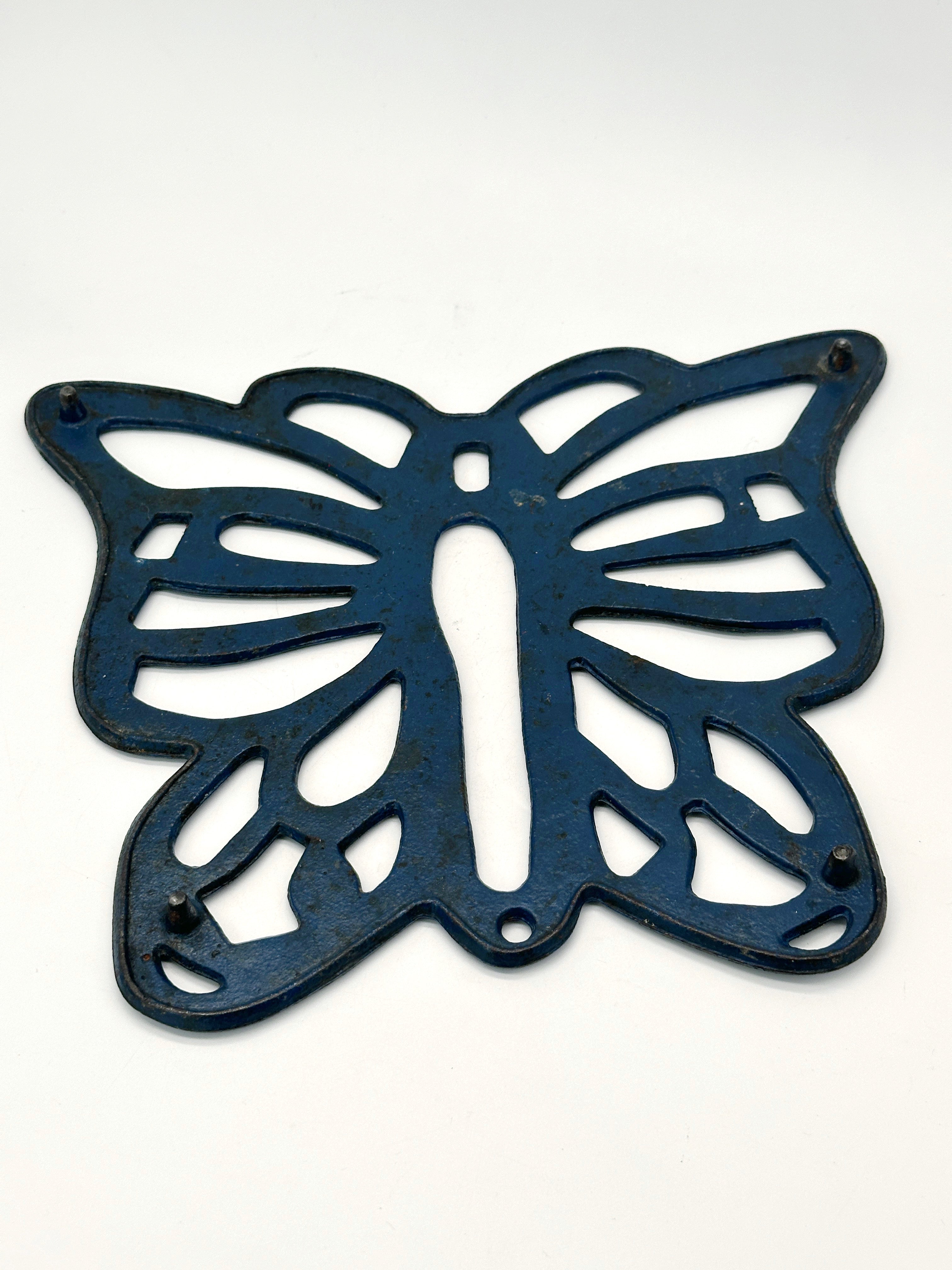 Blauer Untersetzer aus Gusseisen in Schmetterlingsform