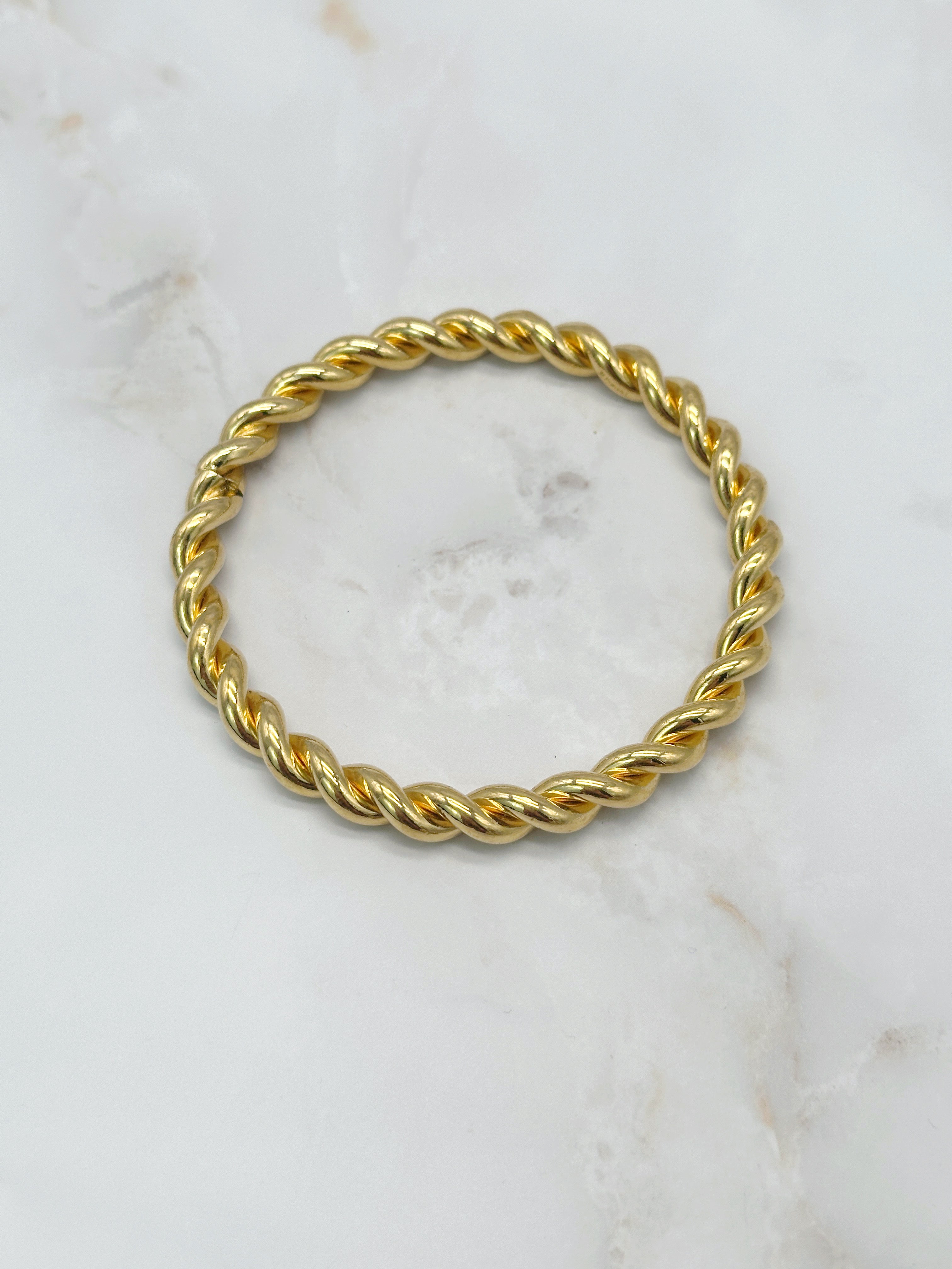 Elegant vintage bangle, twisted and gold-plated