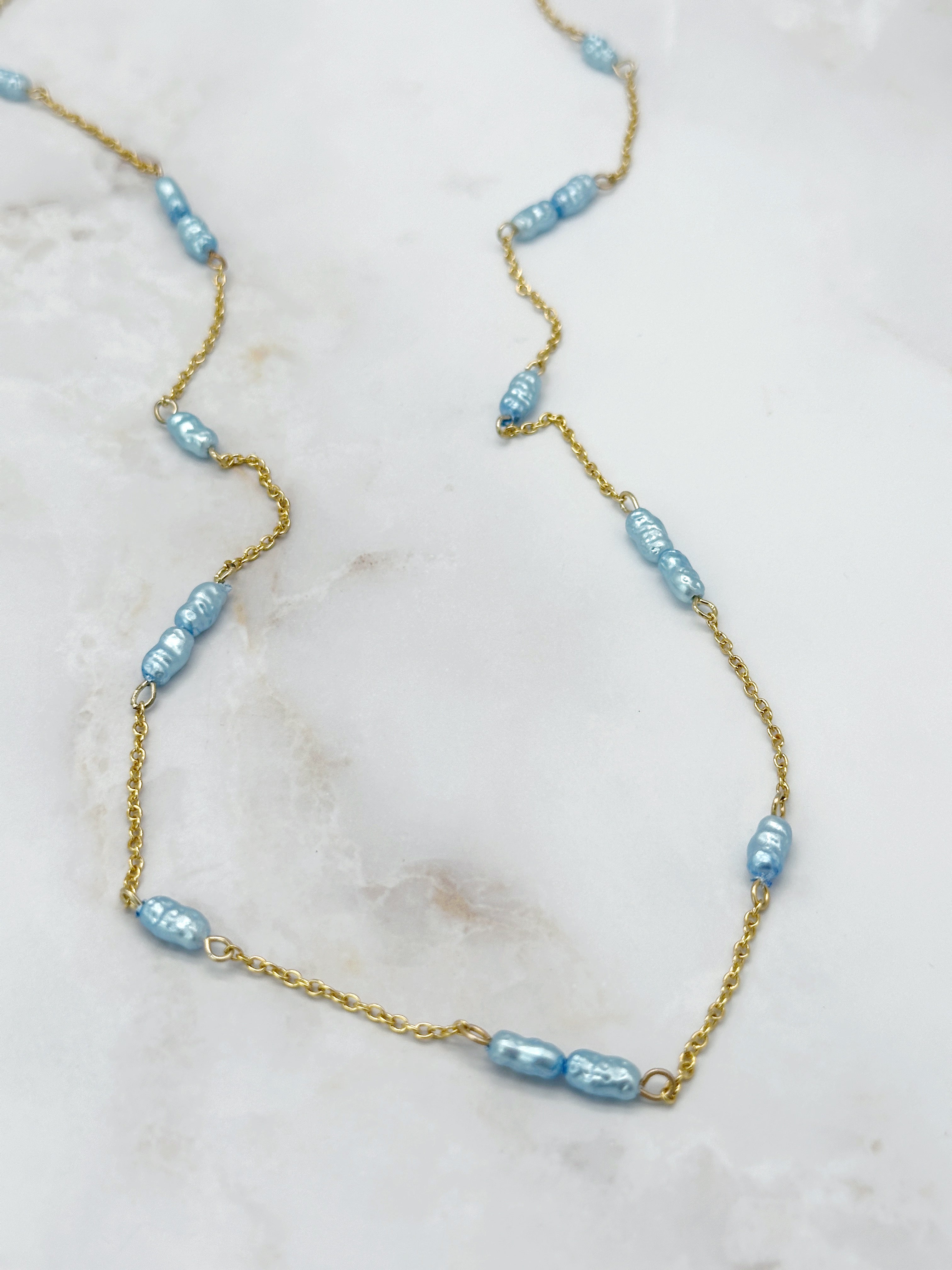 Lange Vintage Halskette mit Imitationsperlen in Champagner oder Blau