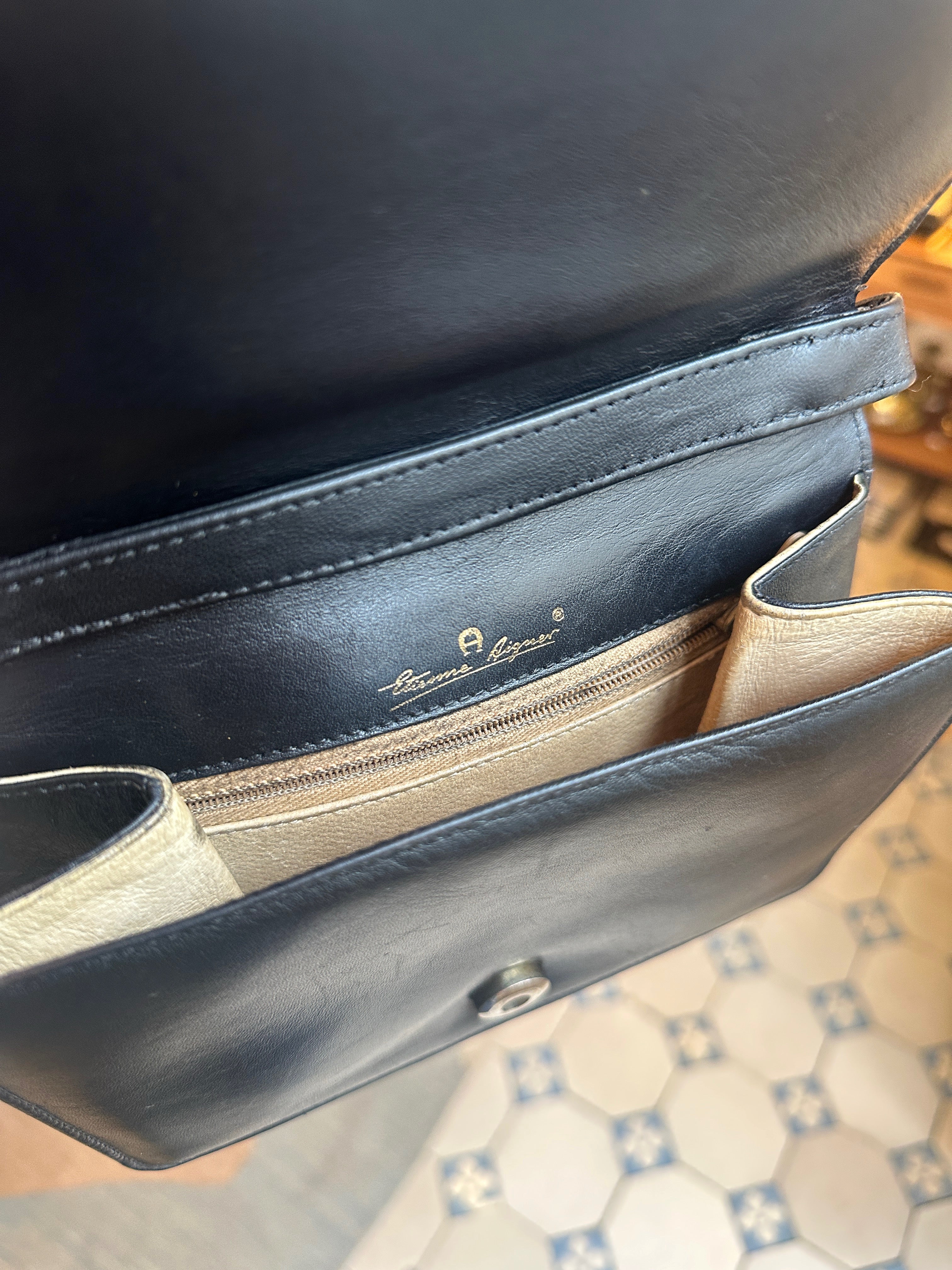 Etienne Aigner Vintage Handtasche aus schwarzem Leder mit Messing-Details