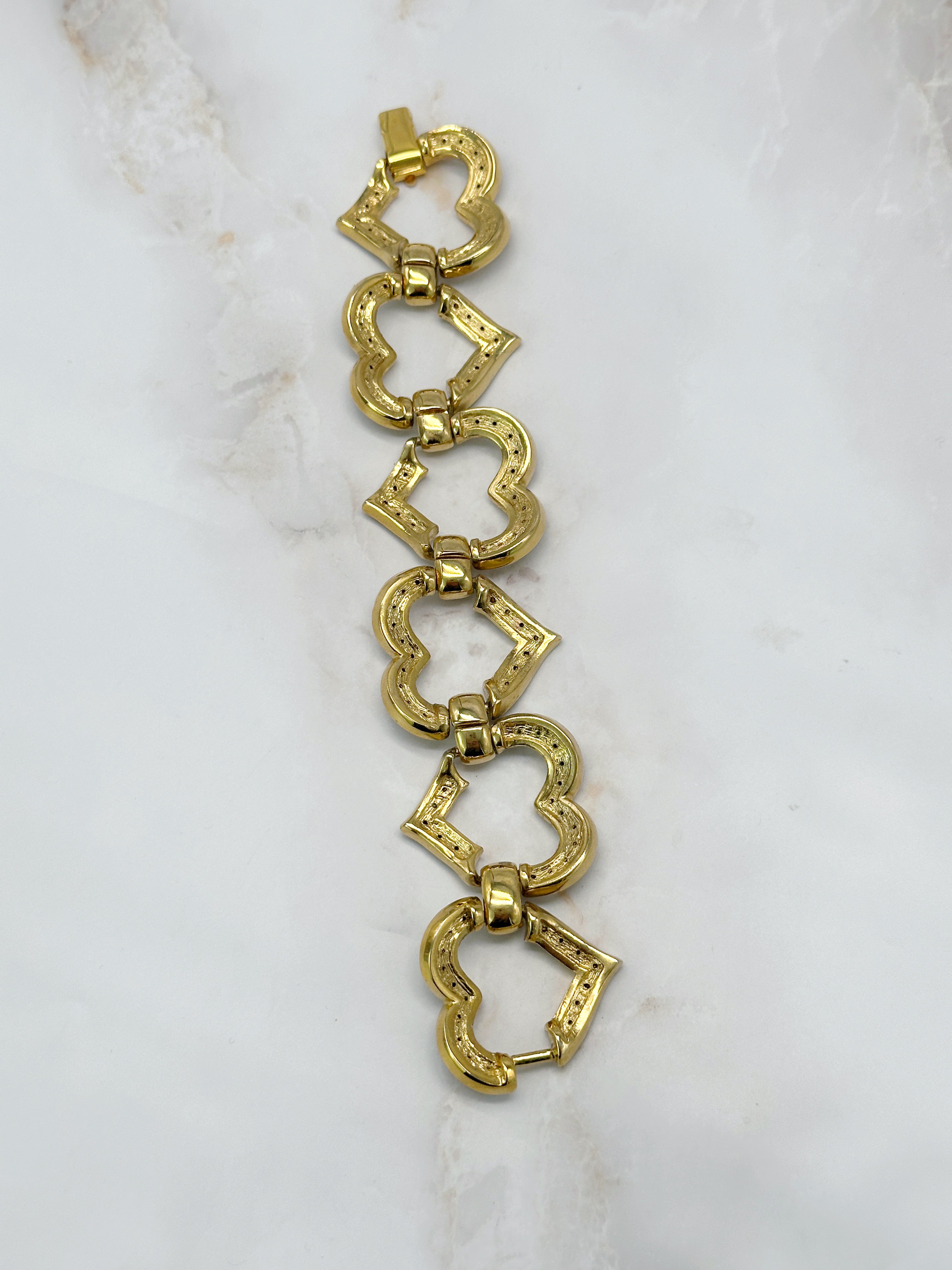 Massives vergoldetes Vintage Armband mit funkelndem Strass-Herz