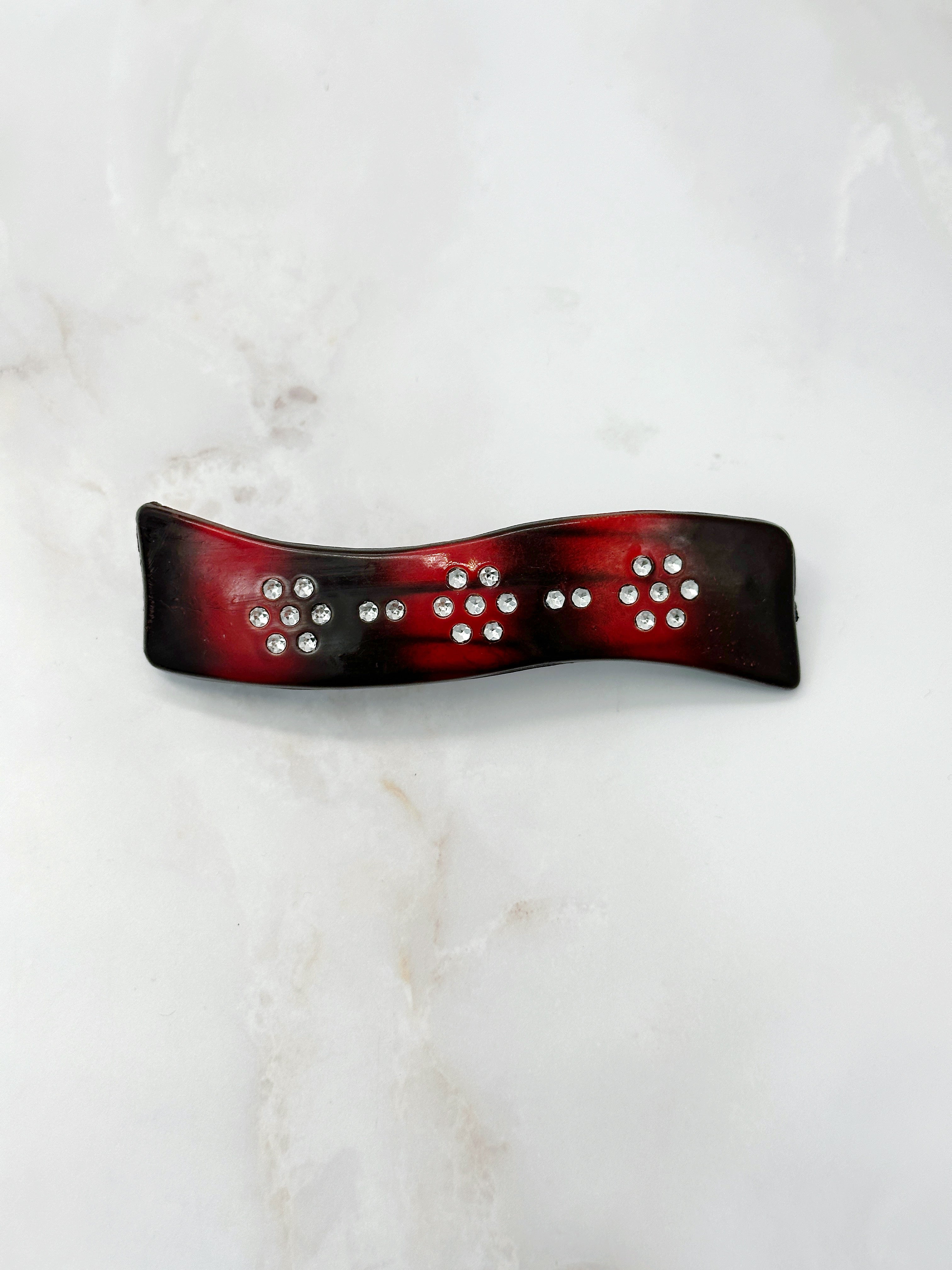 Sparkling wave-shaped hair clip with rhinestones