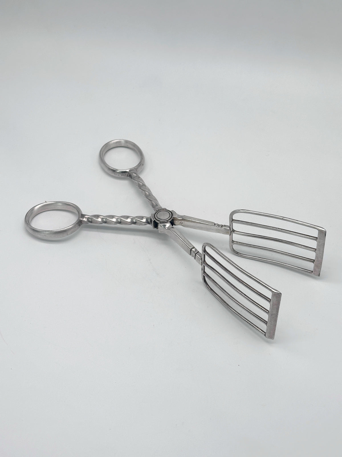Vintage Gebäckzange aus versilbertem Metall