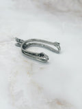 Versilberter Vintage Geldclip in ausgefallener Sporenform