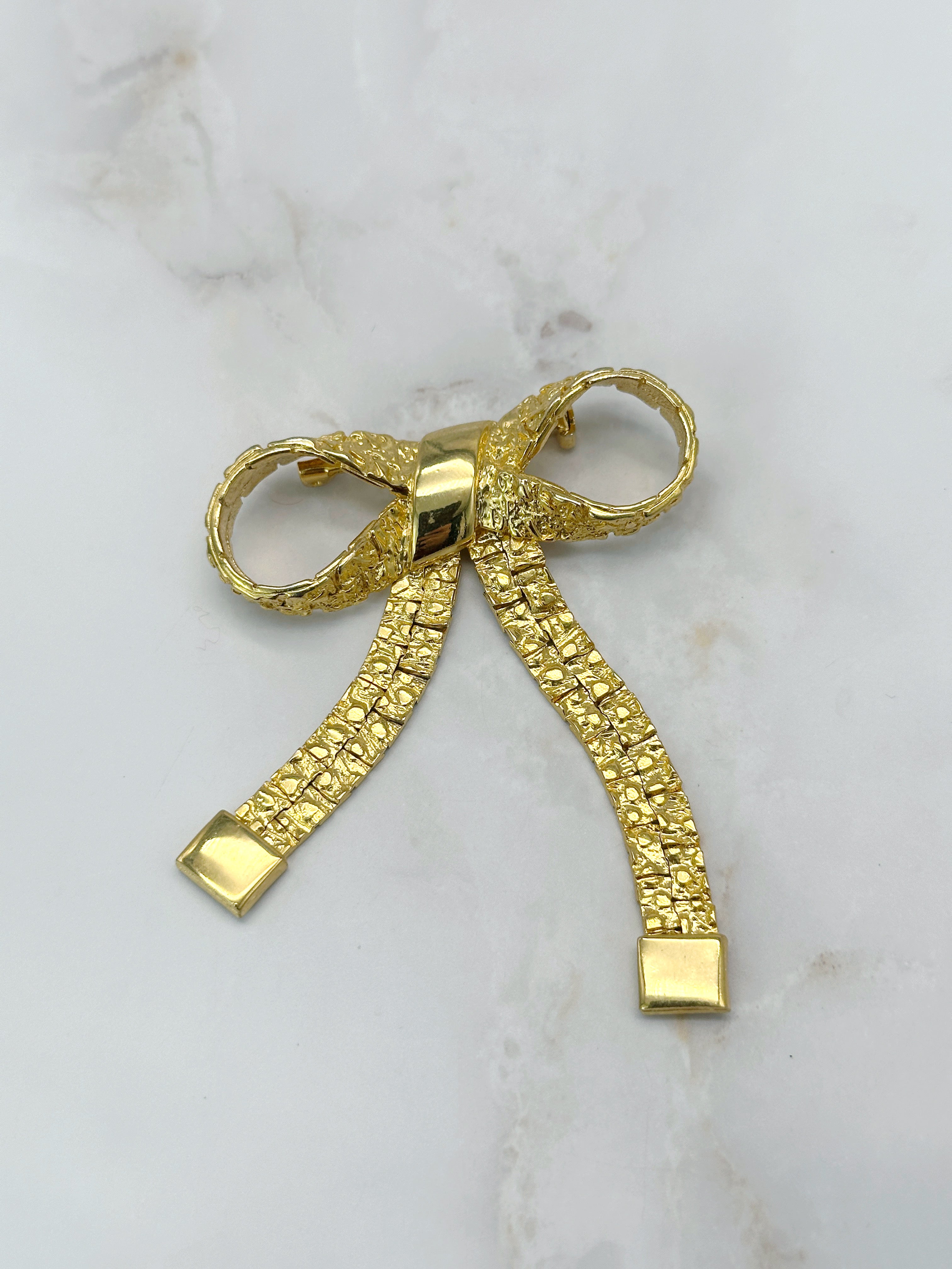 Vergoldete Vintage Brosche im Schleifen-Design mit beweglichen Enden