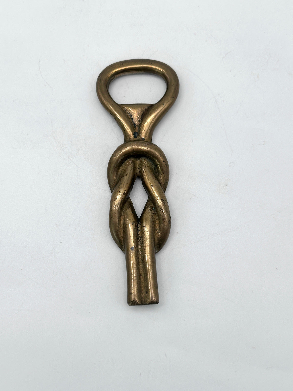 Vintage Flaschenöffner aus Messing mit Knotenmotiv