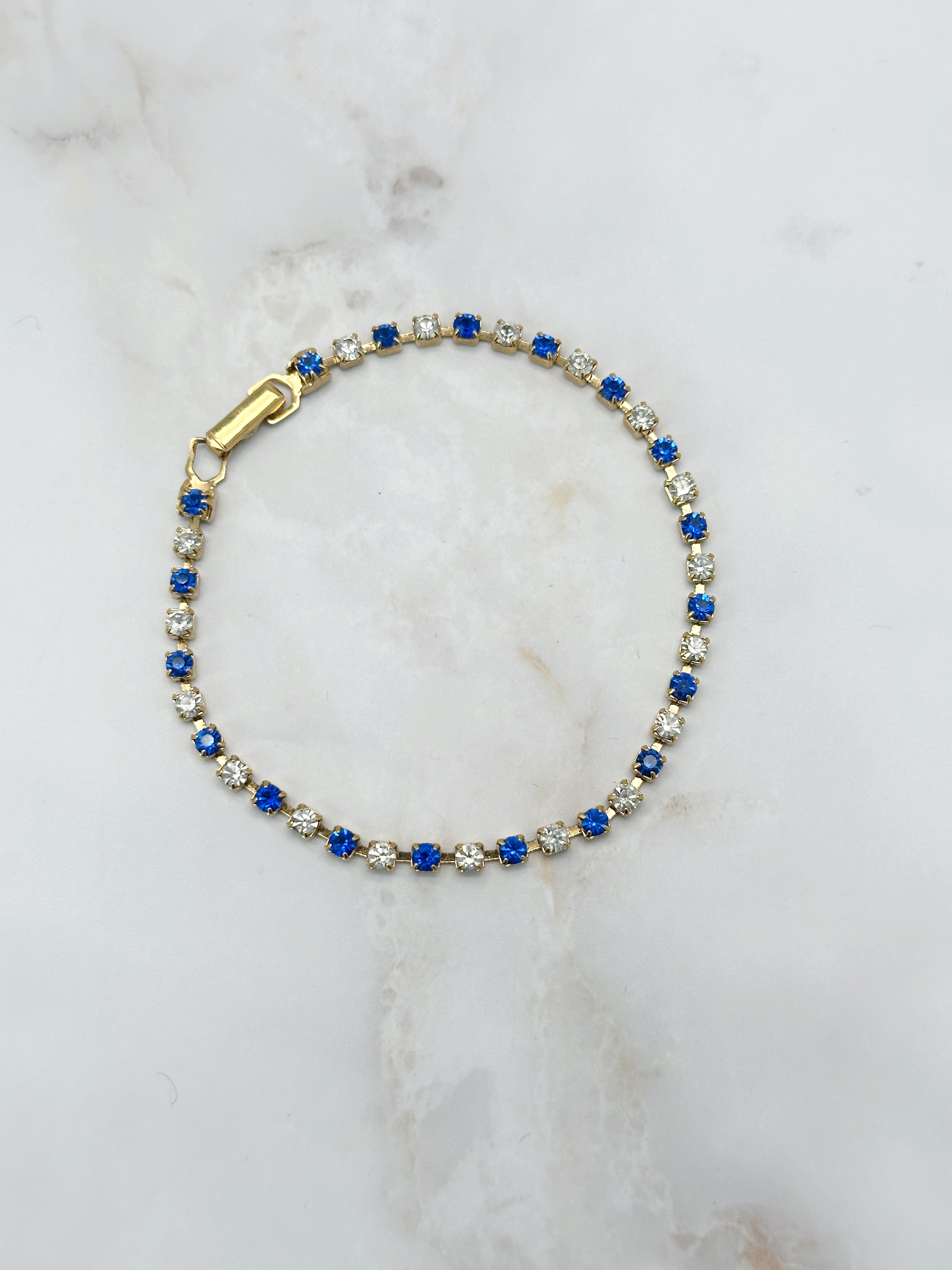 Vergoldetes Vintage Tennis-Armband mit klarem und blauem Strass