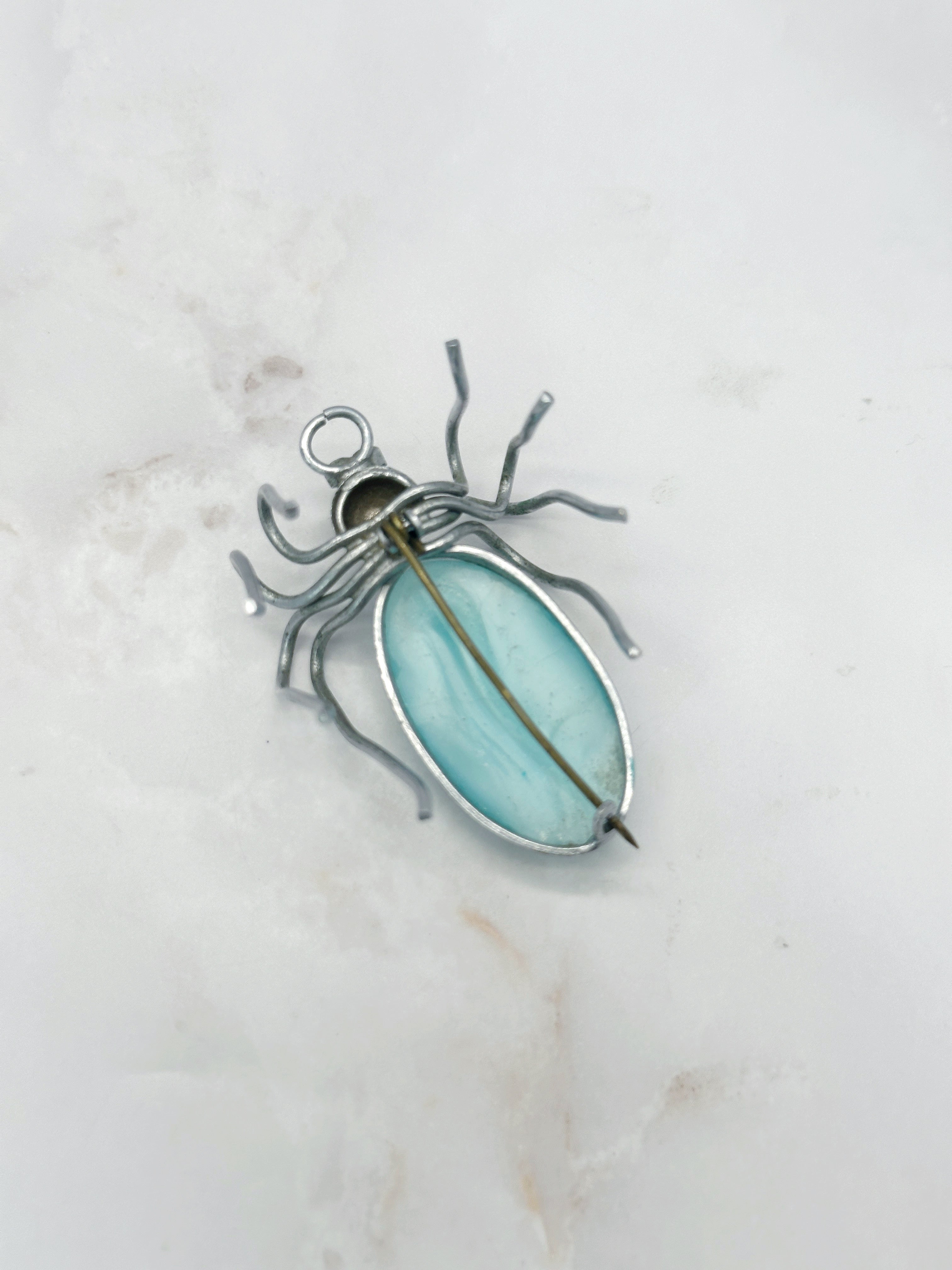 Brosche Spinne mit türkisem Glas
