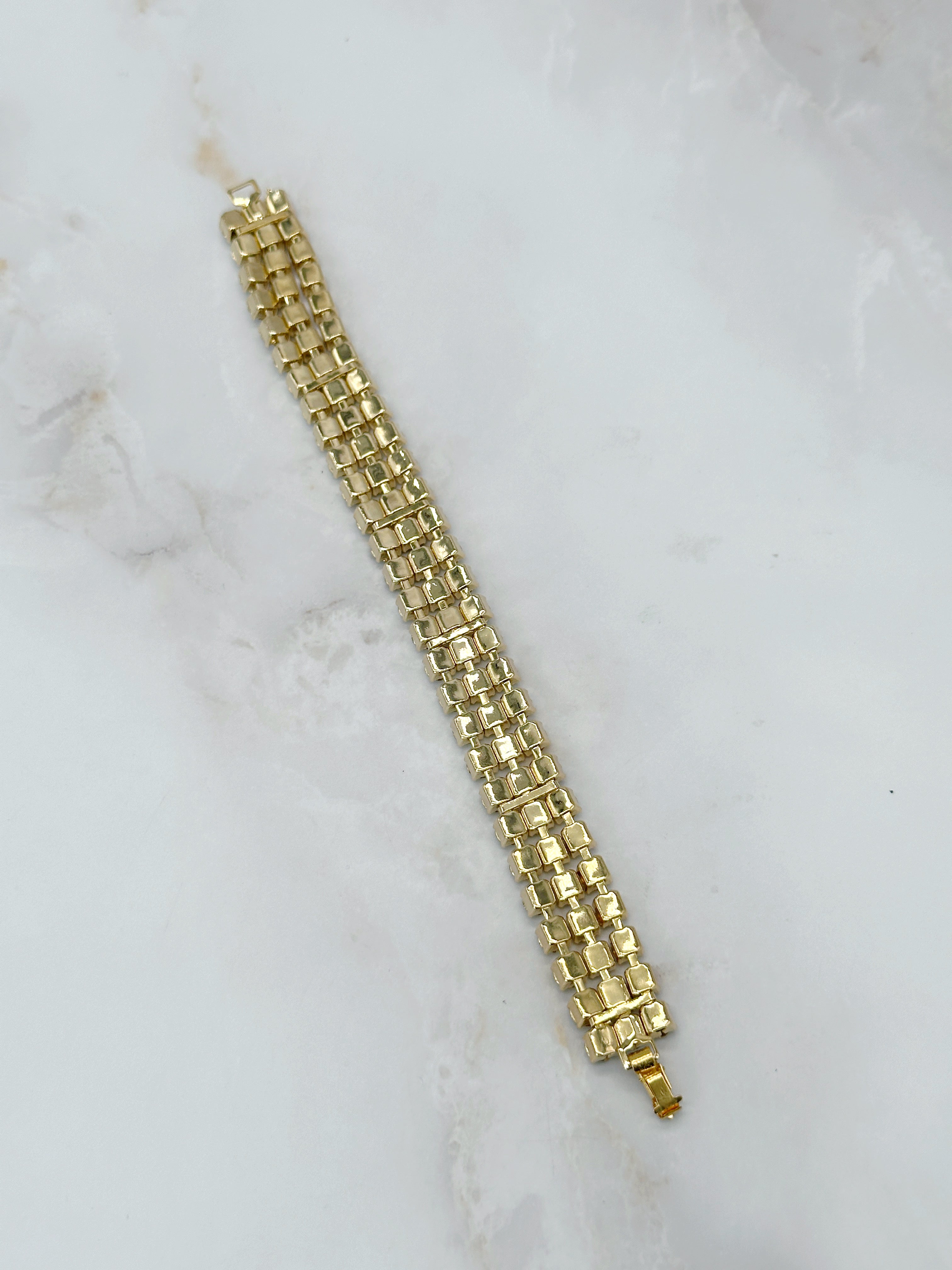 Vergoldetes Strassarmband mit drei Reihen Strass