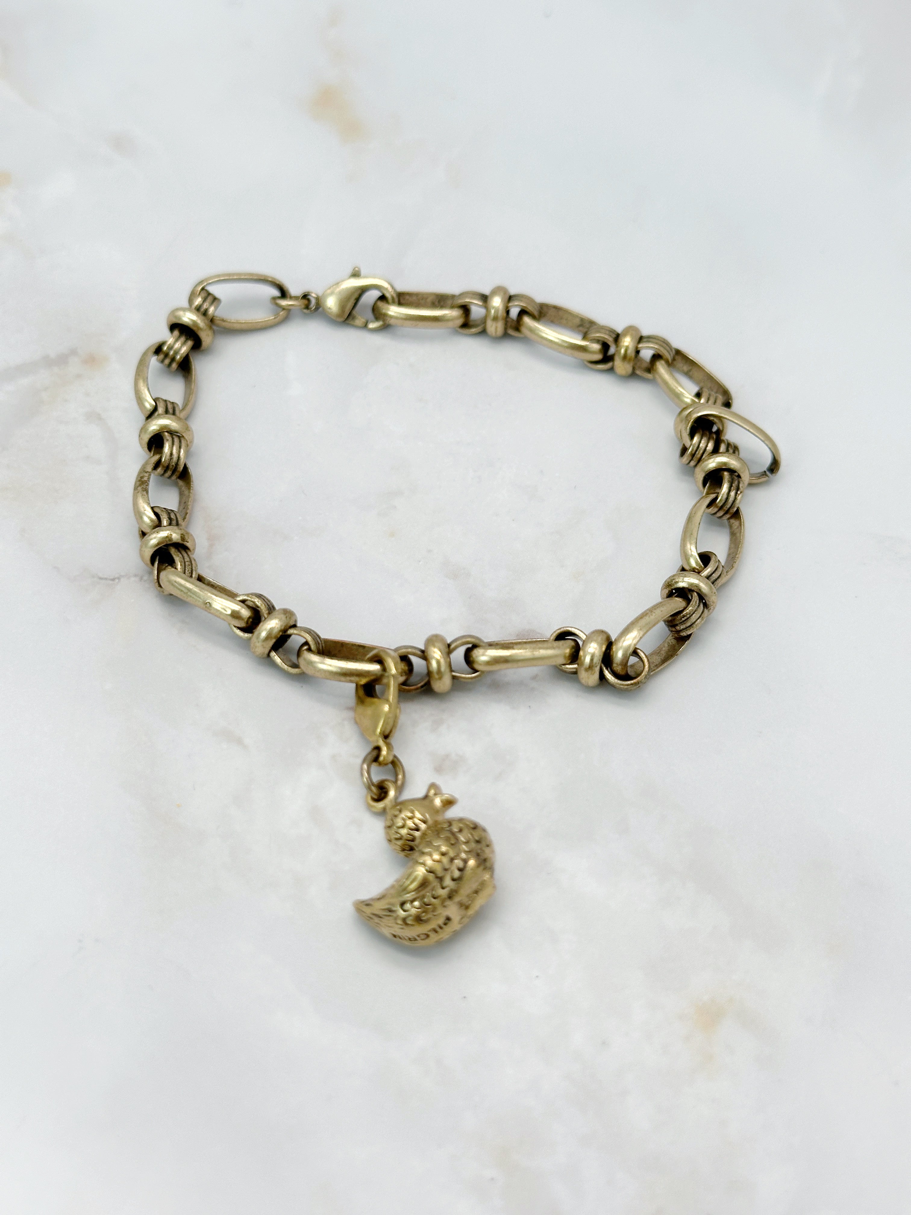 Verspieltes, vergoldetes Armband mit Entenanhänger