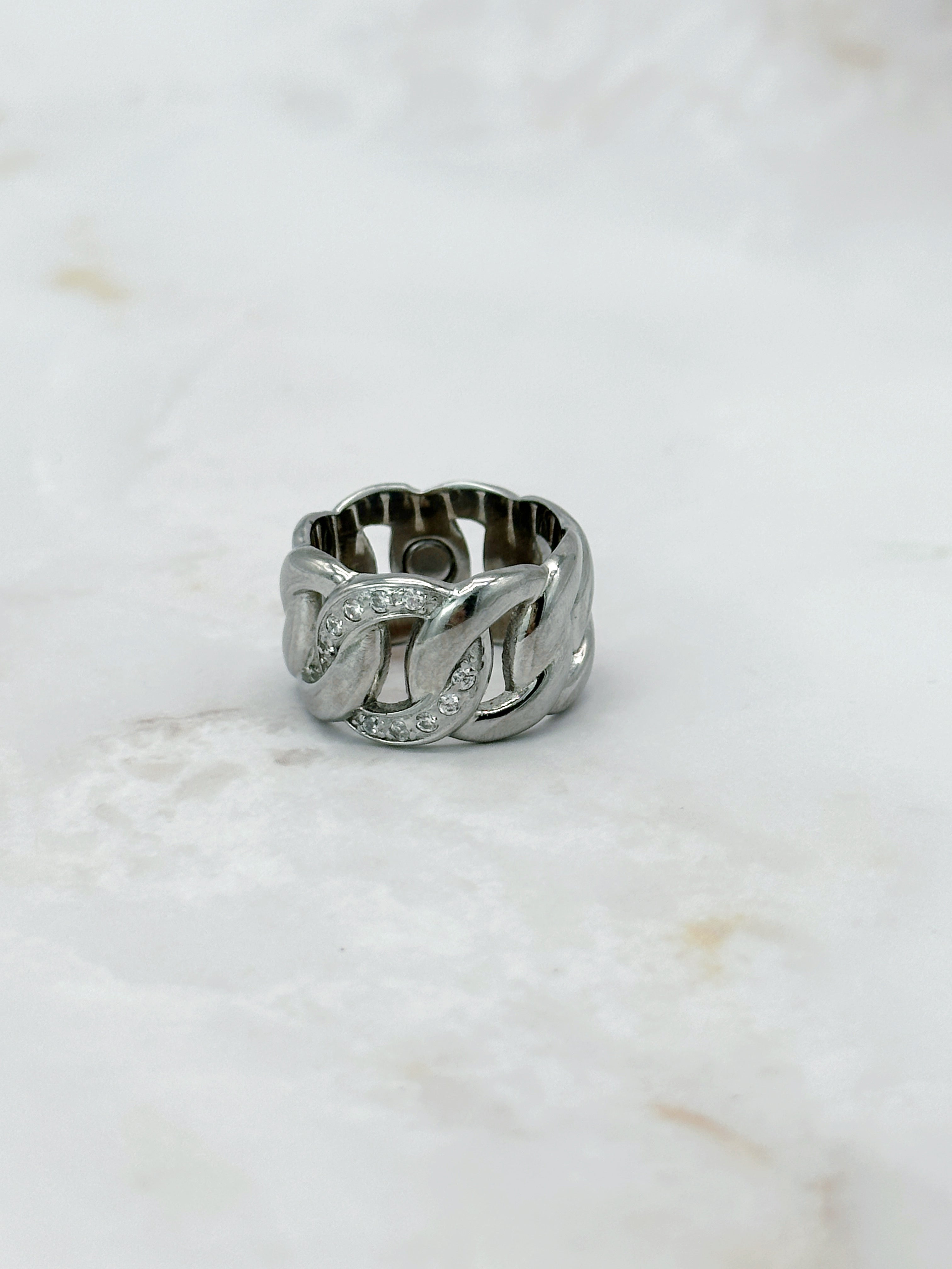 Modern link ring made of stainless steel with rhinestones