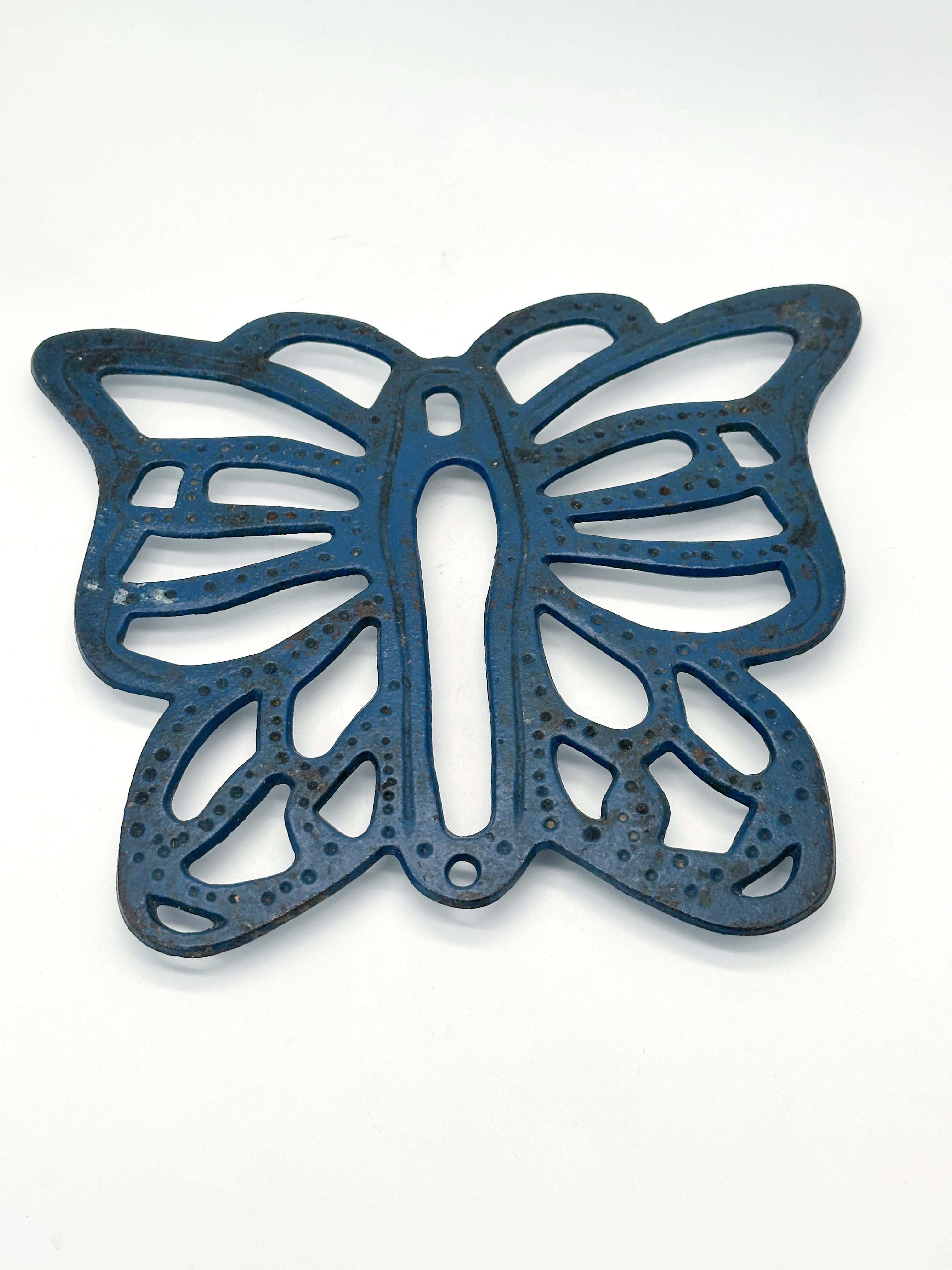 Blauer Untersetzer aus Gusseisen in Schmetterlingsform
