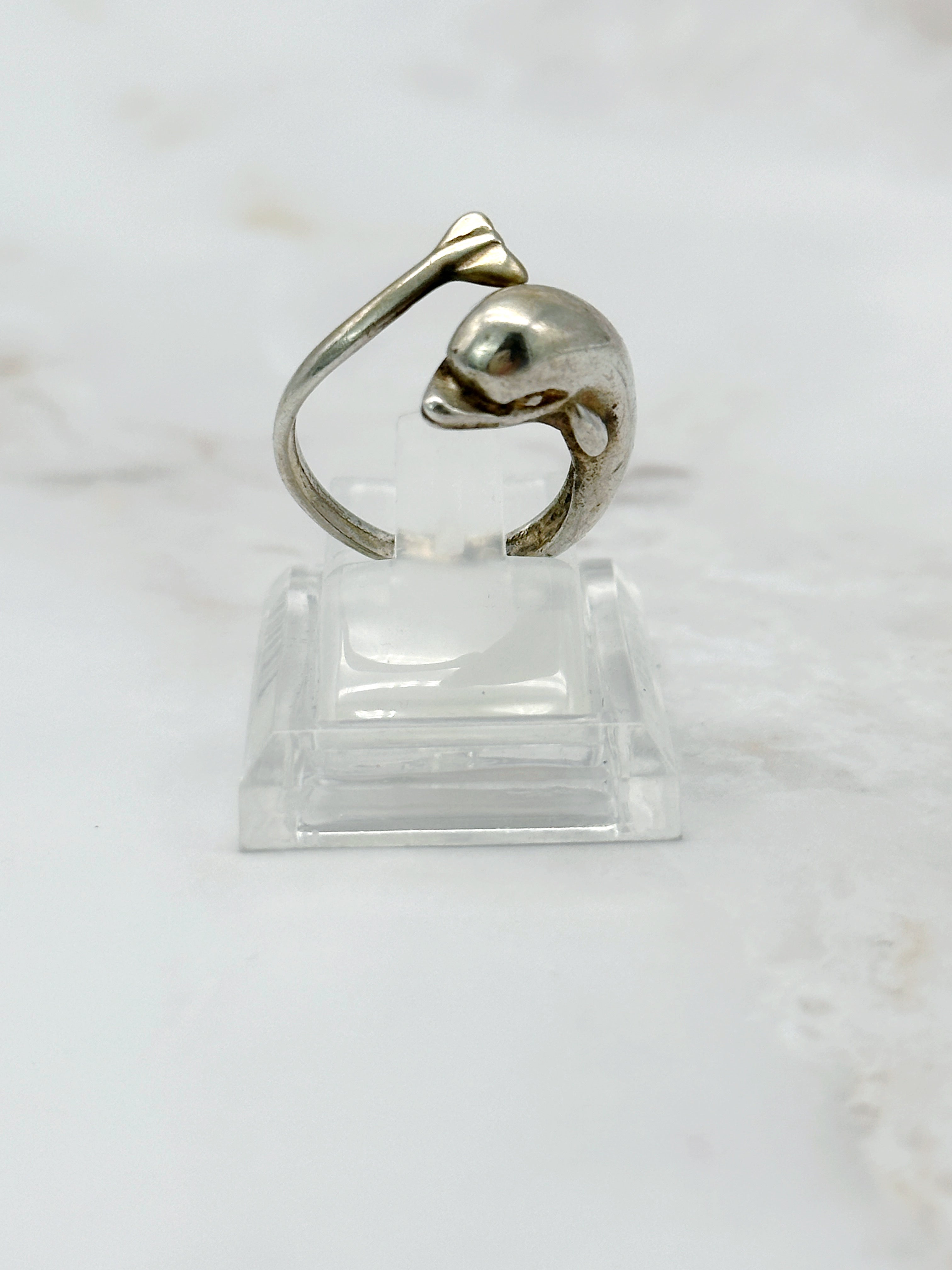 Silver ring with dolphin motif
