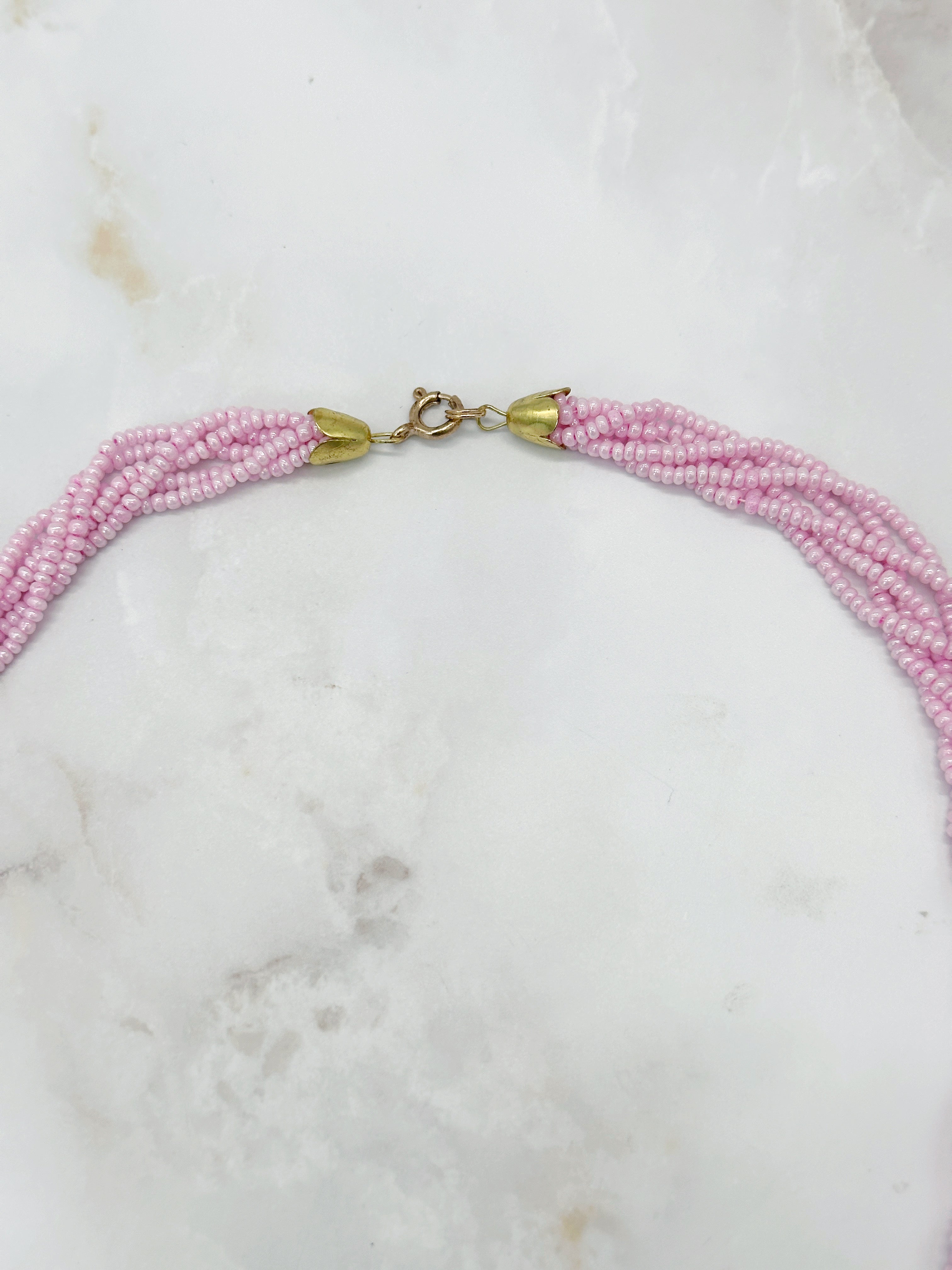 Vintage Halskette mit gedrehten rosa Perlensträngen